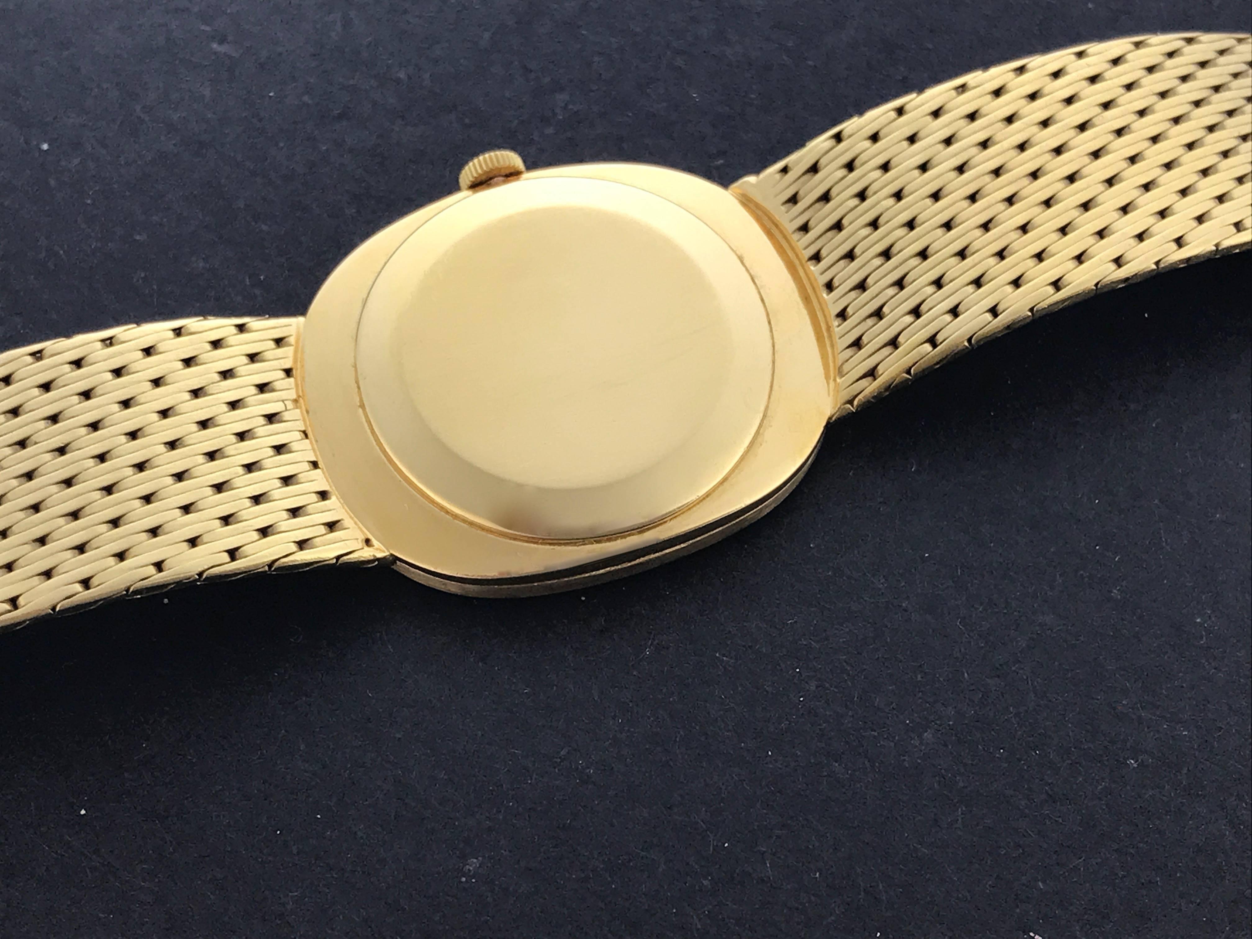Patek Philippe Yellow Gold Blue Dial Ellipse Manual Wind Wristwatch In Excellent Condition For Sale In Dallas, TX