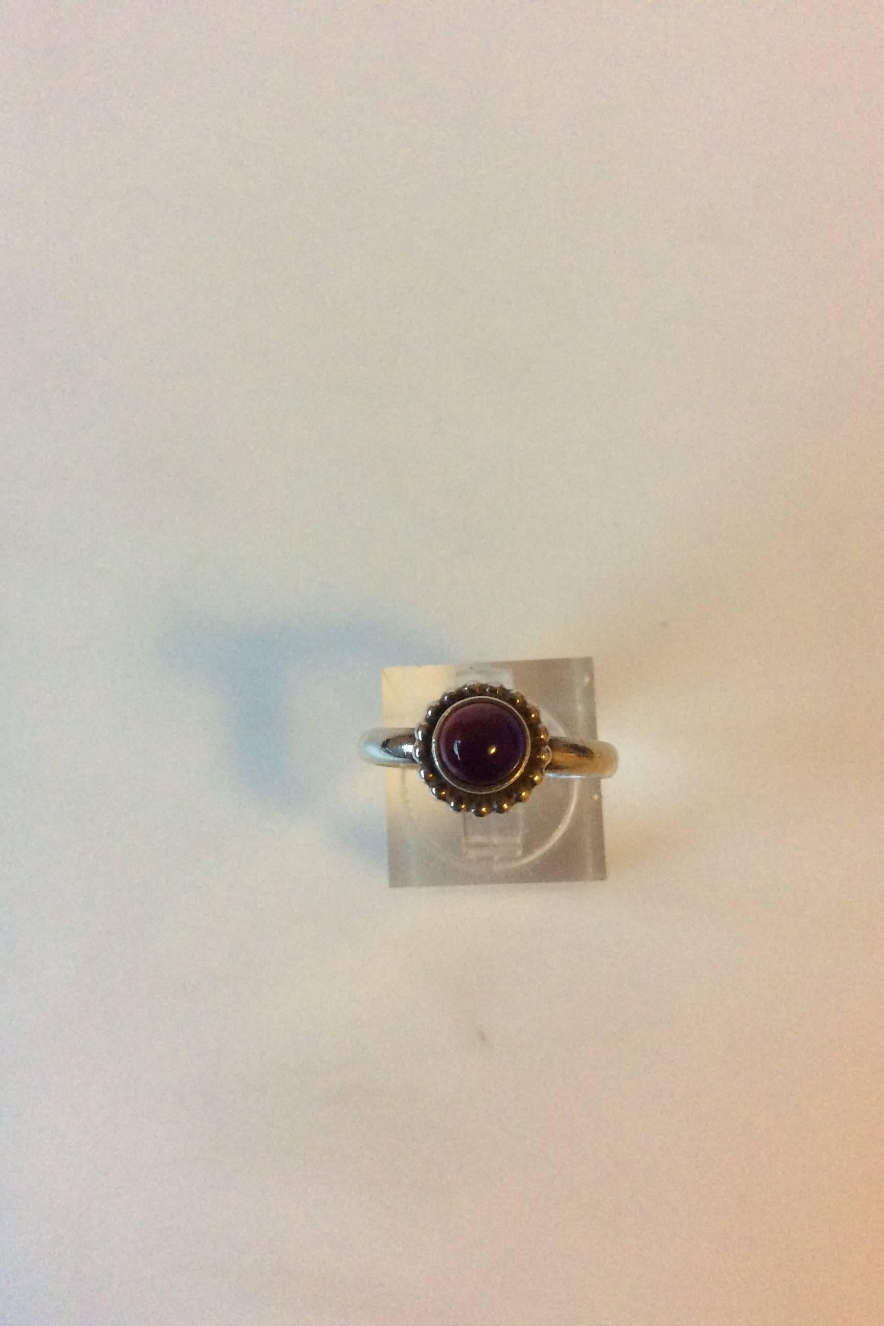 Georg Jensen Sterling Solver Ring No 9B Moonlight Blossom with Purple Stone. Size 54 (Us size 6 1/2). Weighs  <0.20 oz