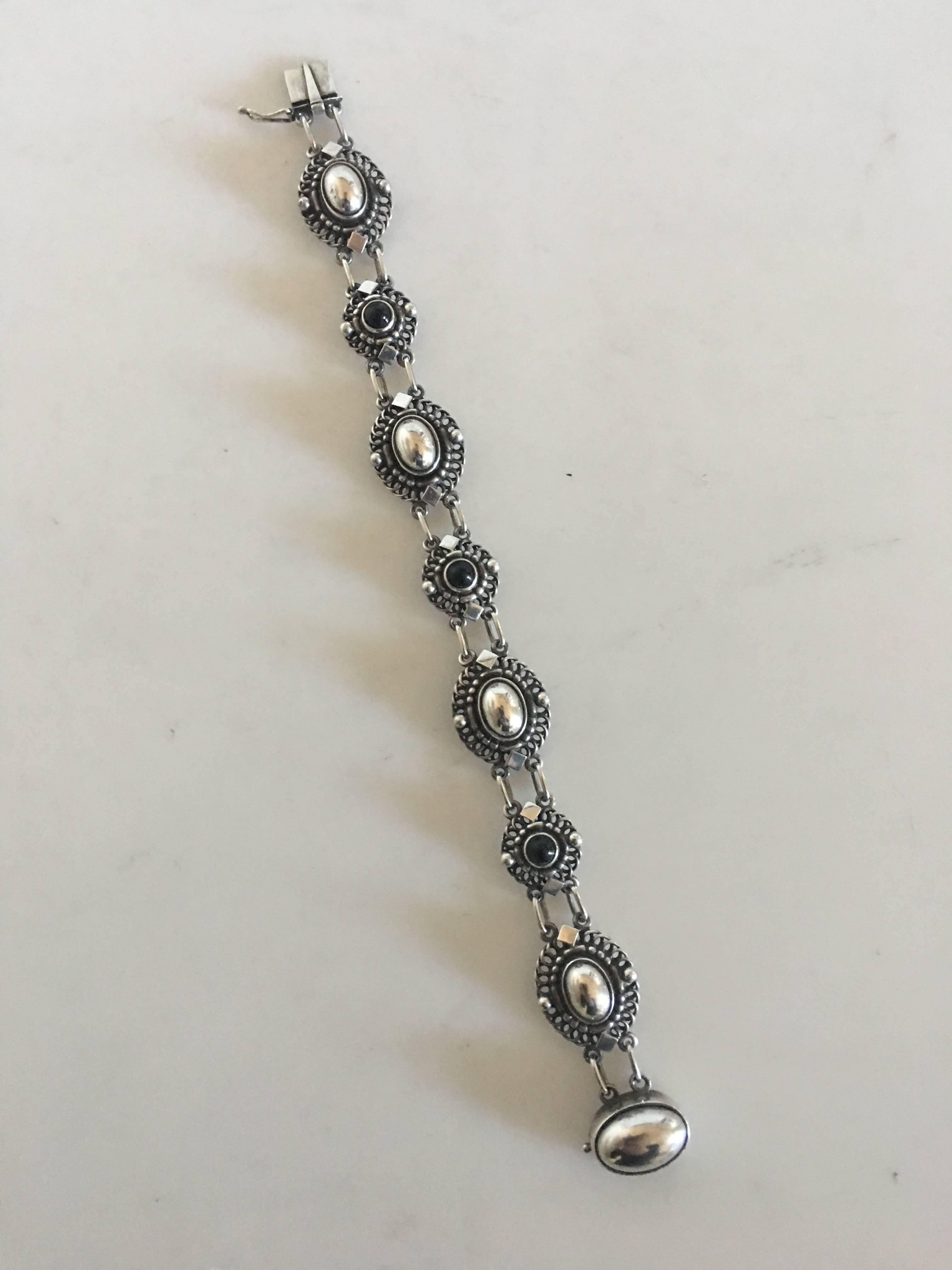 Georg Jensen Sterling Silver Bracelet No. 419 with Black Onyx Stones. Measures 19.5 cm L (7 43/64