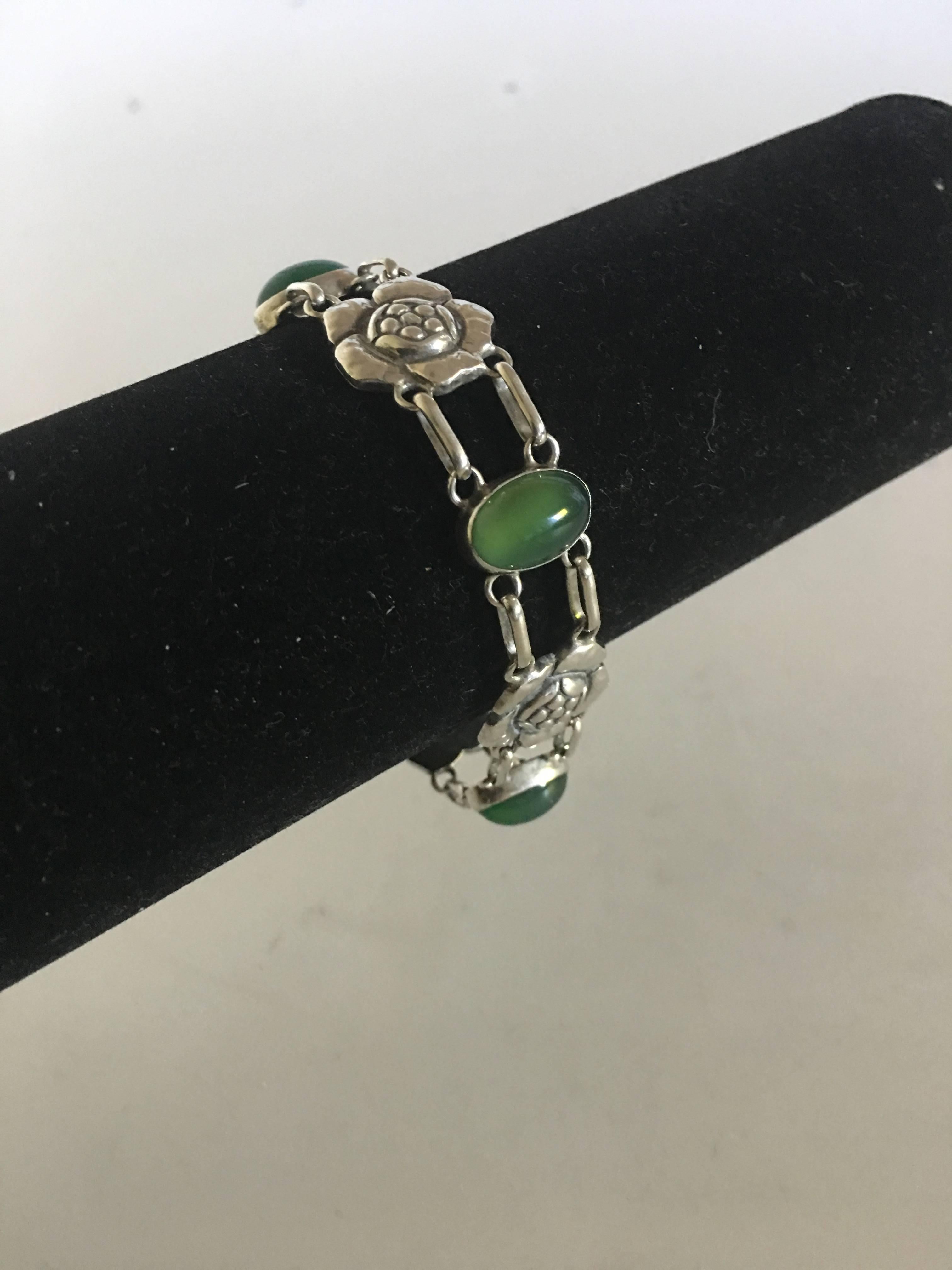 Georg Jensen Silver Bracelet No. 12 with Green Agates. Made around 1919 - 1927. Measures 19.5 cm L (7 43/64