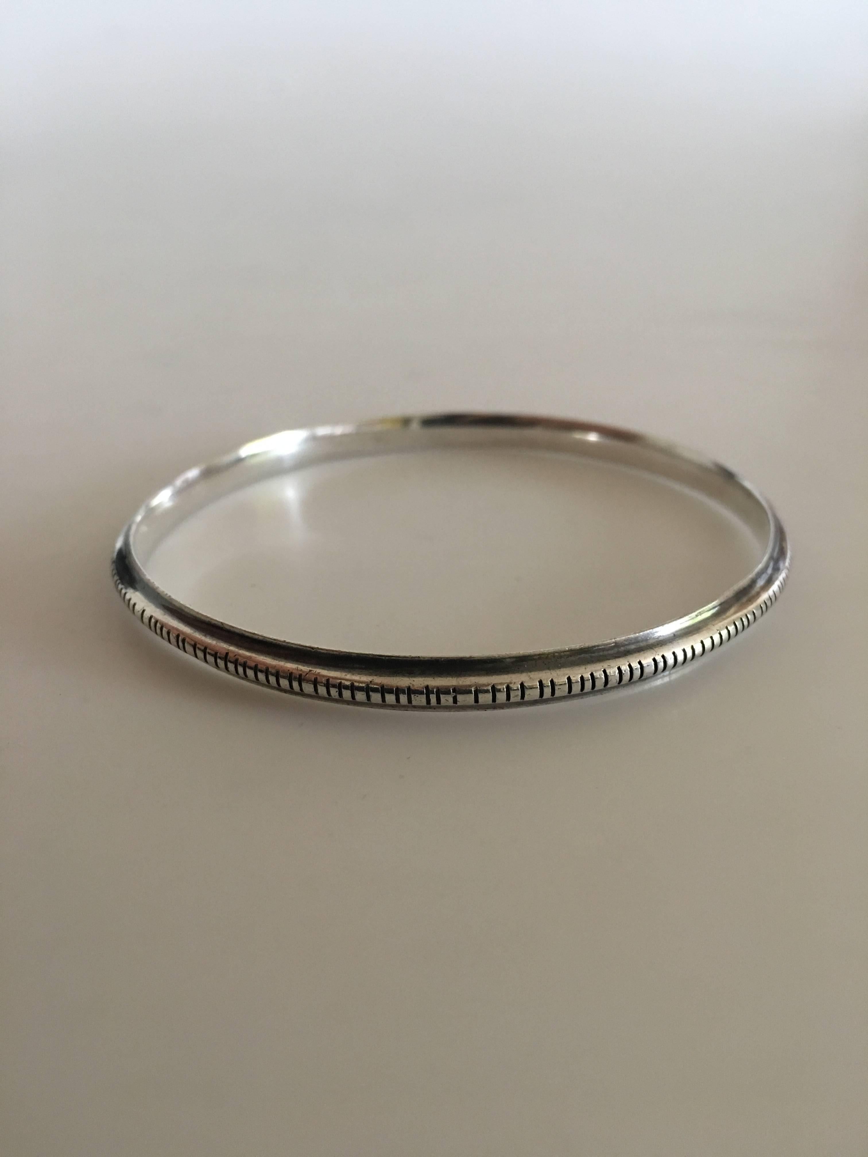 Hans Hansen Sterling Silver Bangle Bracelet No. 209. Measures 6.1 cm Inner Diameter (2 13/32