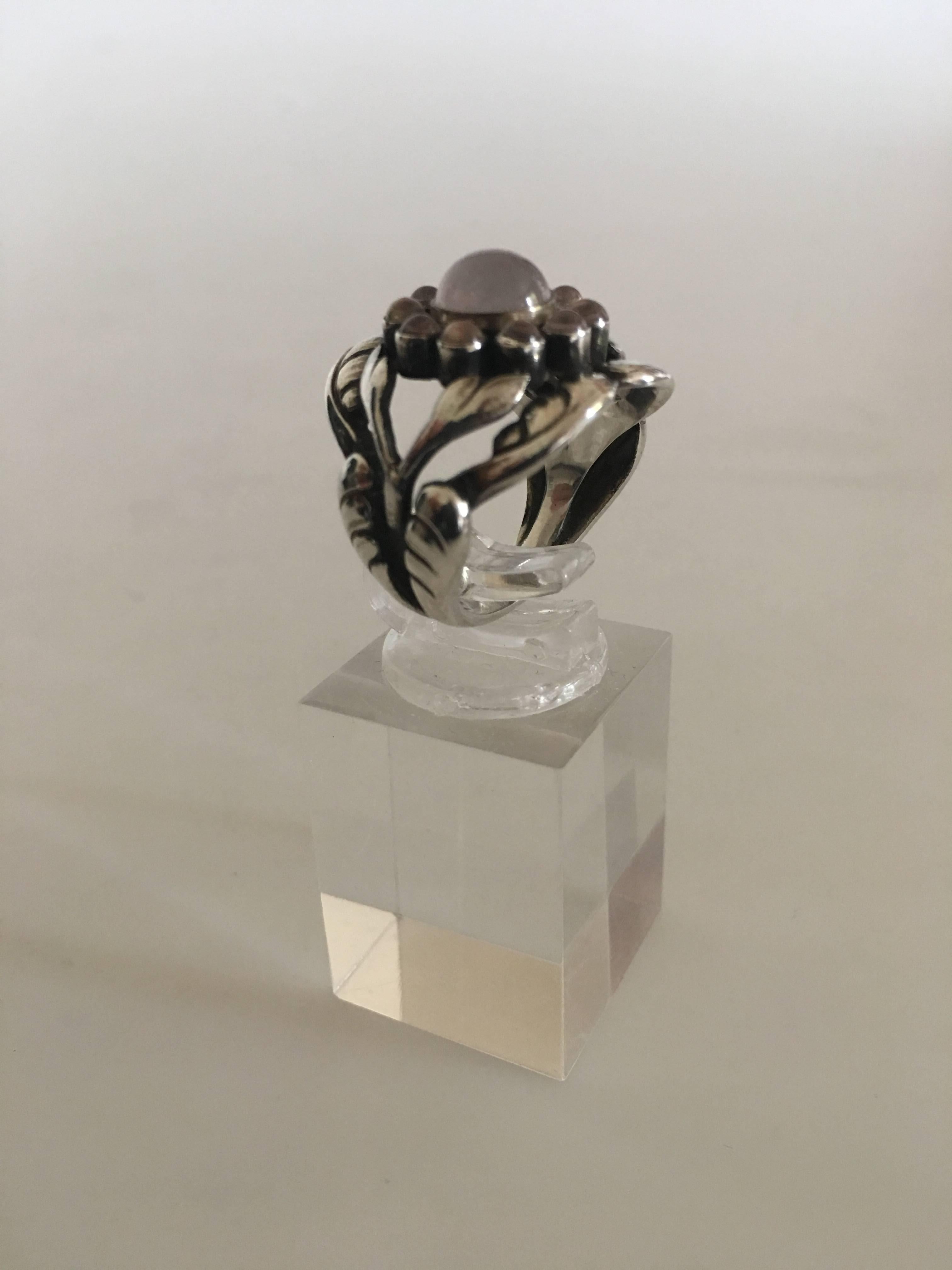 Georg Jensen Sterling Silver Ring No. 10 with Rose Quartz. Size 50 (Us Size 5). Weighs 8 grams. Measures roughly 2 cm. Manufactured after 1945.