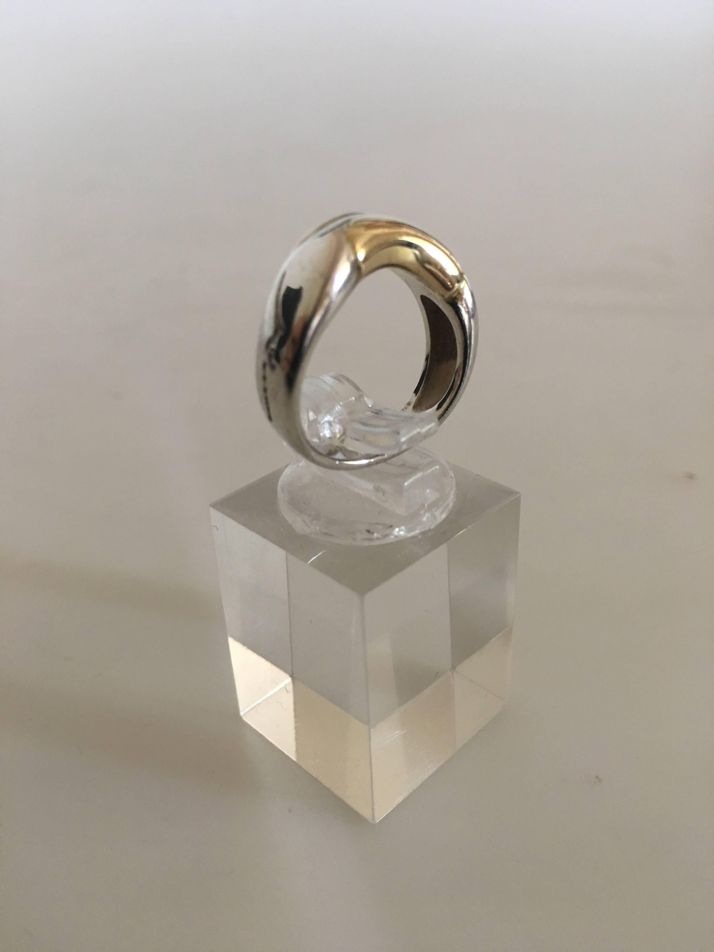Georg Jensen Ring No. 347 in Sterling Silver and Gold by Minas Spiridis. Ring Size 48 (US Size 4½). Design from the 1990s.