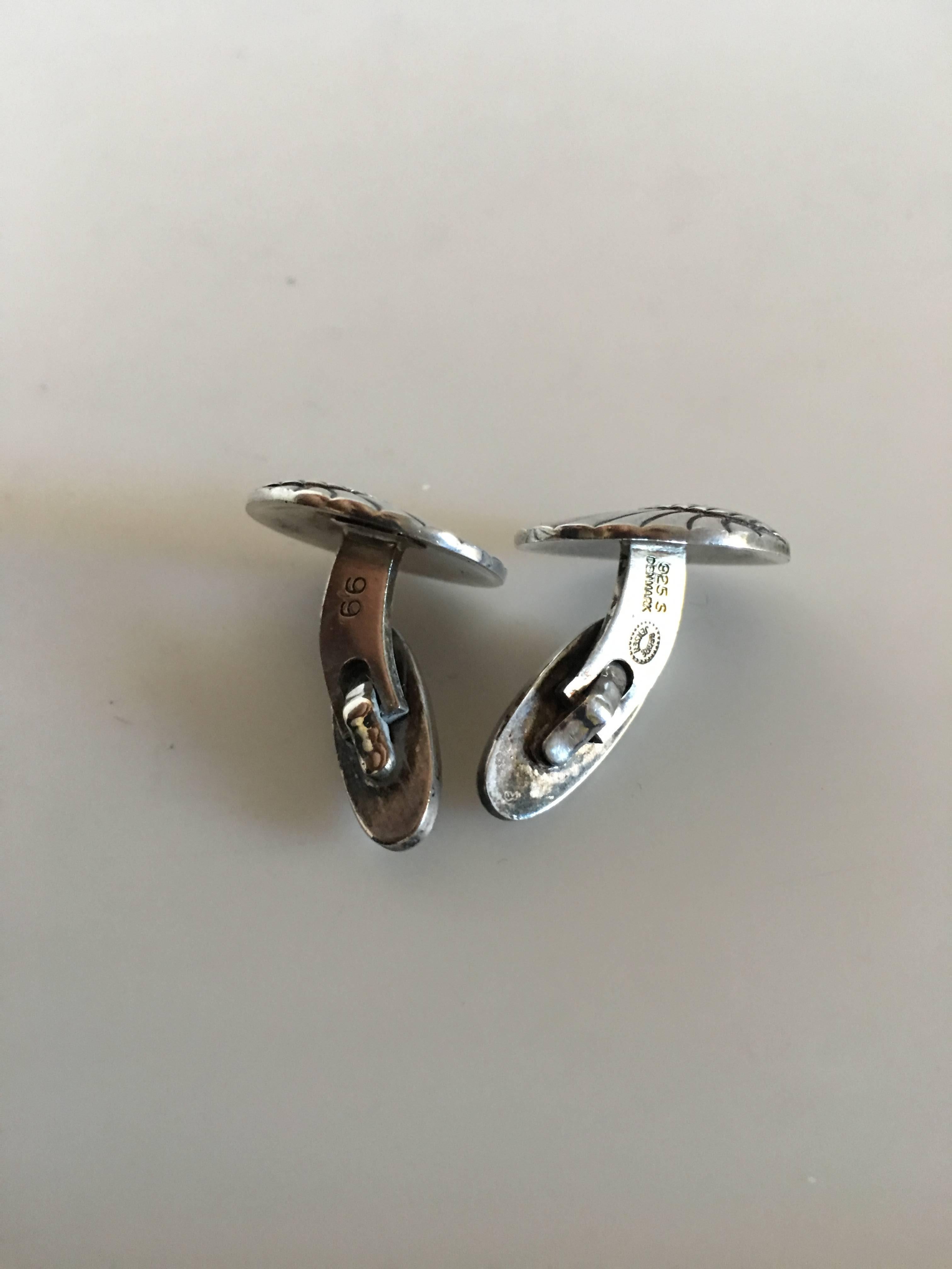 Georg Jensen Sterling Silver Cufflinks No. 66. 2 cm diameter. Combined weight of 13 grams. From after 1945.