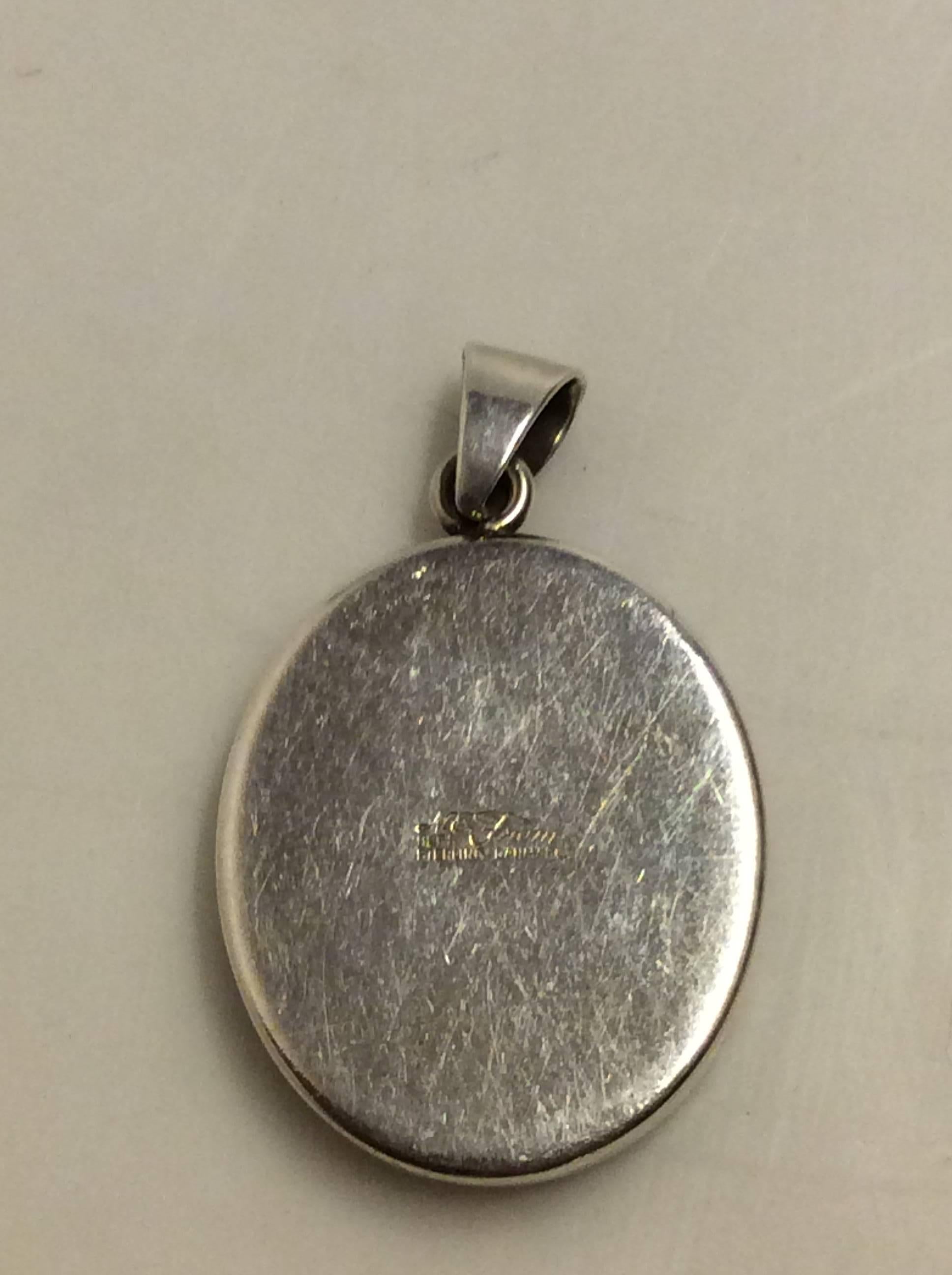 Niels Erik From Sterling Silver Pendant with Tigereye.

Measures 3,2cm x 2,5cm ( 1 1/4