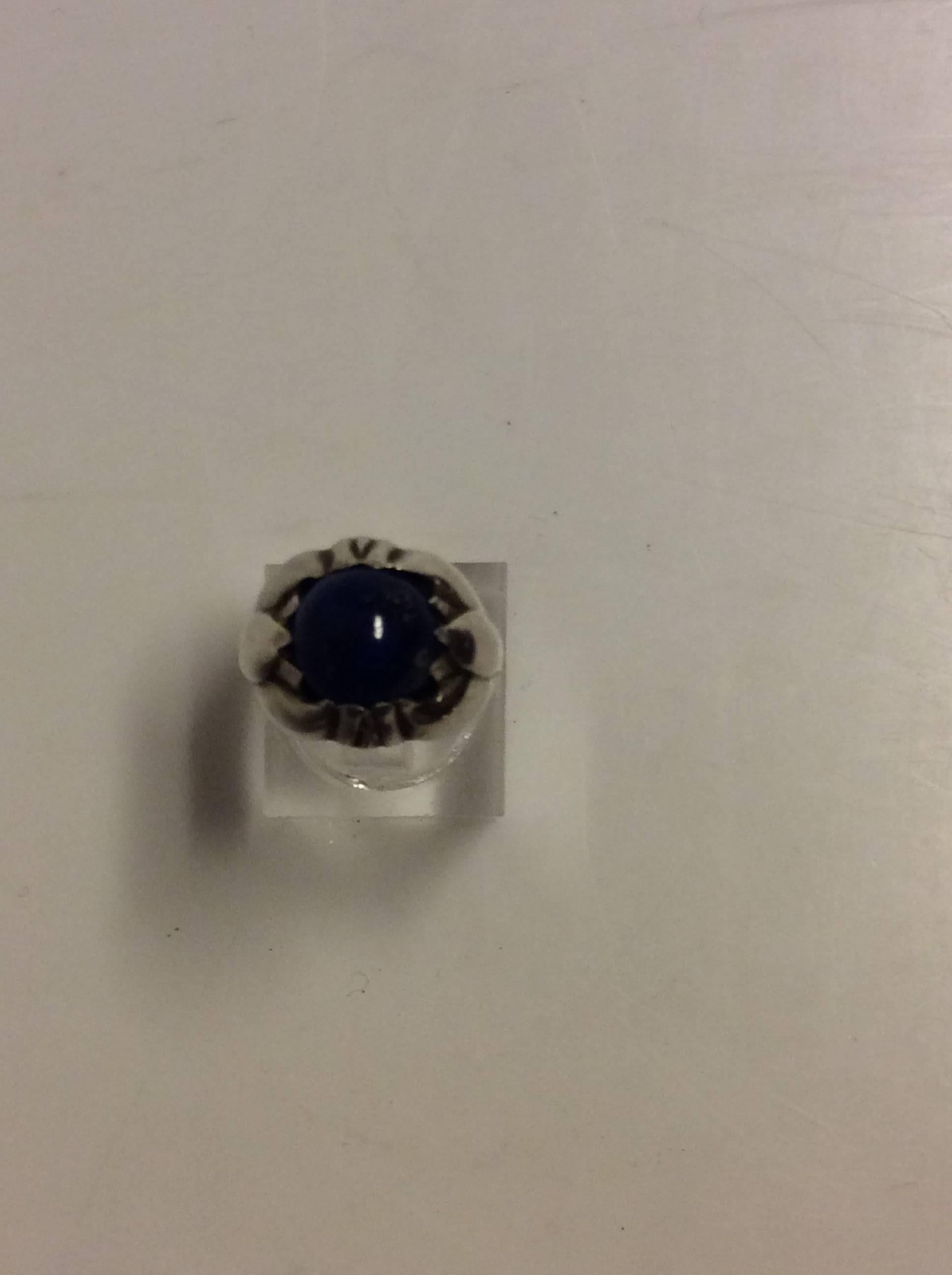Georg Jensen Sterling Silver Ring with Lapis Lazuli from 1933-1944 no. 59

Ring size is 48 or US 4 1/2 

Weight is 5.24 grams / 0.185 oz.