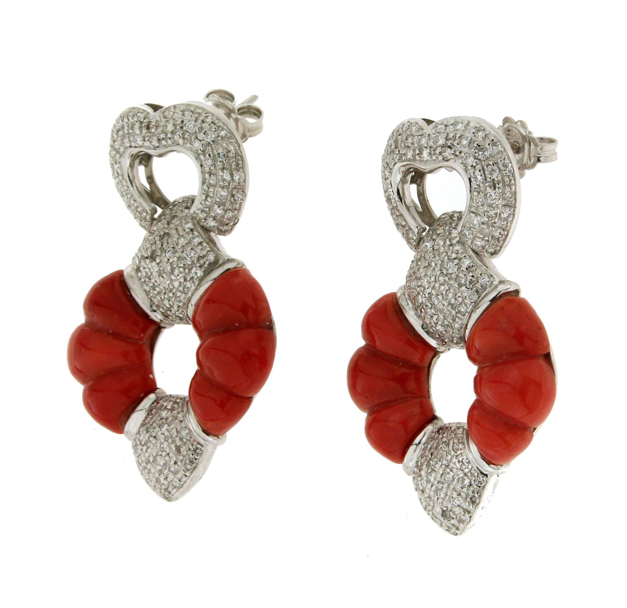 Sardinia coral white gold 18 karat diamonds drop earrings.

Earrings weight 25.50 gr
Coral weight 5.60 gr
Diamonds weight 2.10 karat
