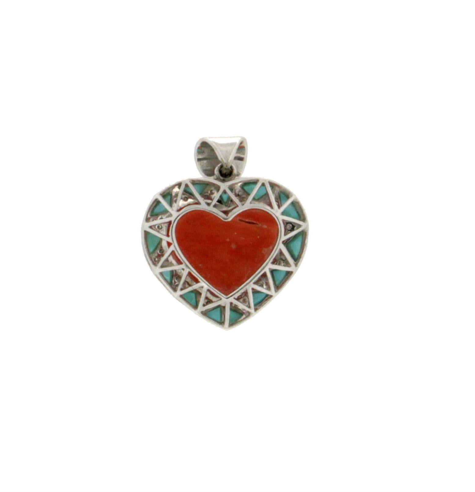 Coral Heart 18 Karat White Gold Mounted With Turquoise And Diamonds Pendant Necklace

Pendant weight 7.20 grams
Diamonds weight 0.22 karat
Coral weight 2.30 grams
(the price is without chain)
