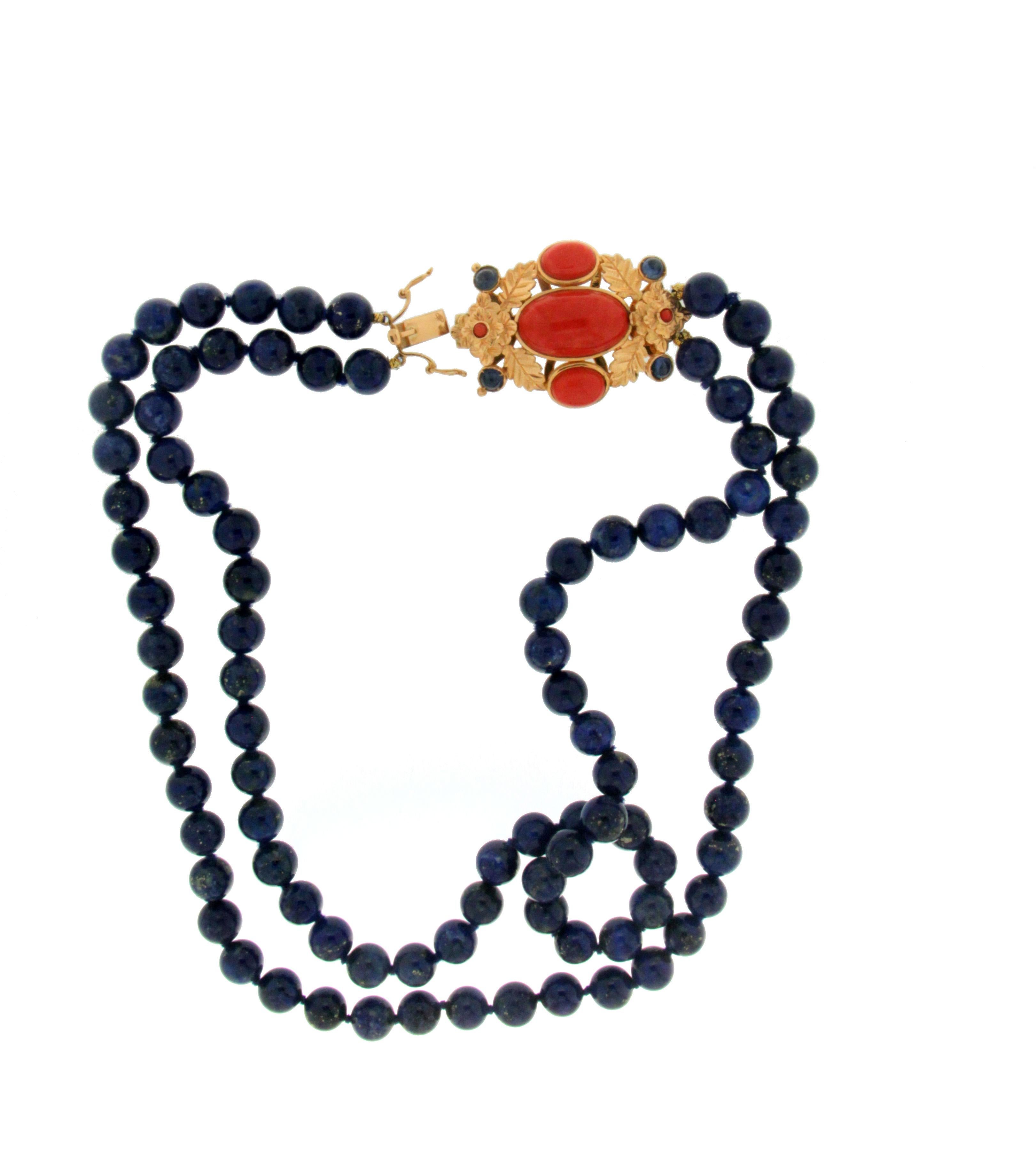 Lapis Lazuli 18 karat yellow gold with clasp mounted in coral and sapphires multi-strand necklace

Necklace total weight 120 grams
Coral weight 3.50 grams
Sapphires weight 2.05 karat
Each lapis lazuli is 0.90 cm
Necklace length 46 cm (Necklace open)
