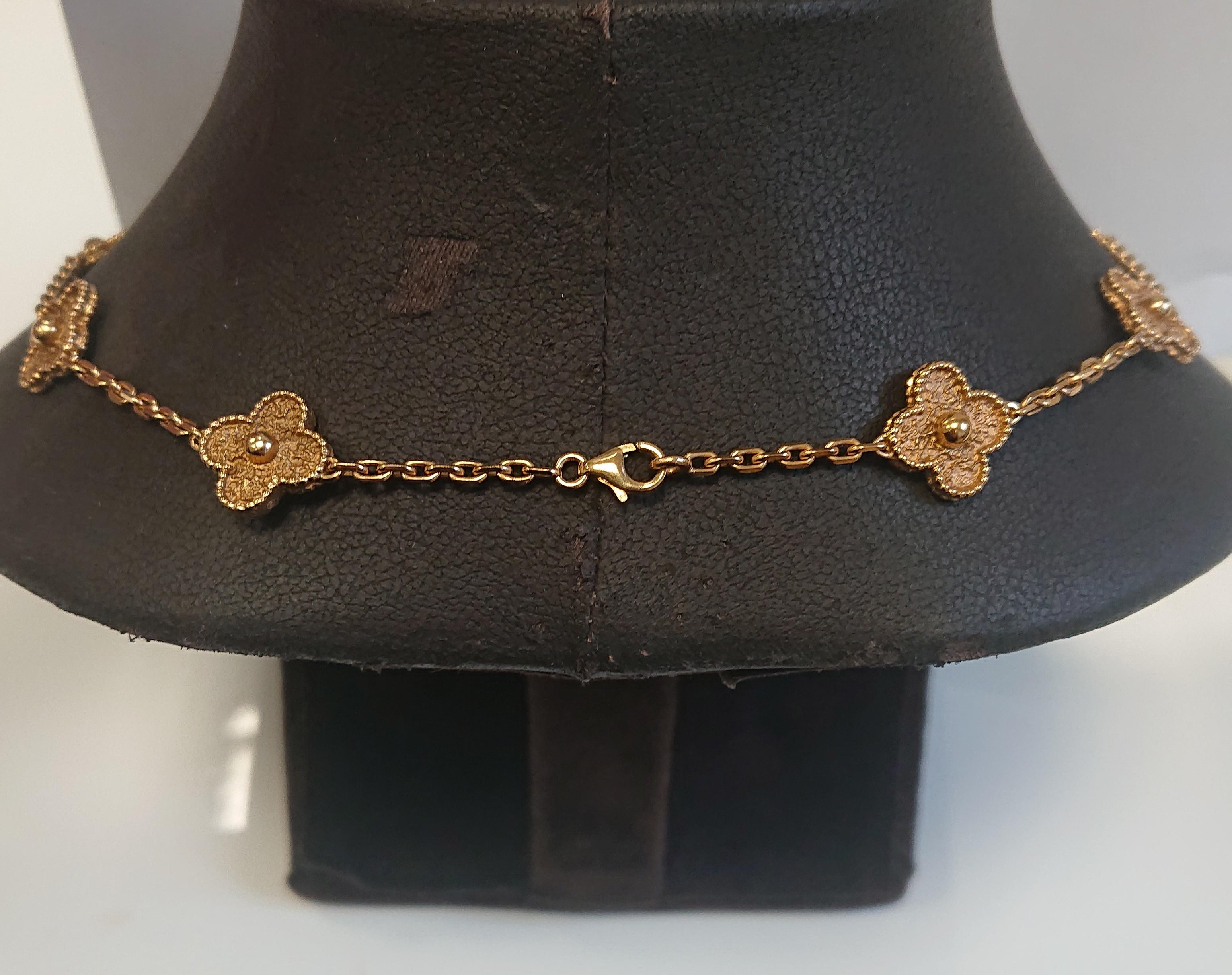 A Van Cleef & Arpels 10 Motif Alhambra Rose Gold Chain Necklace. Set in 18ct rose gold with 10 textured motifs. Signed 