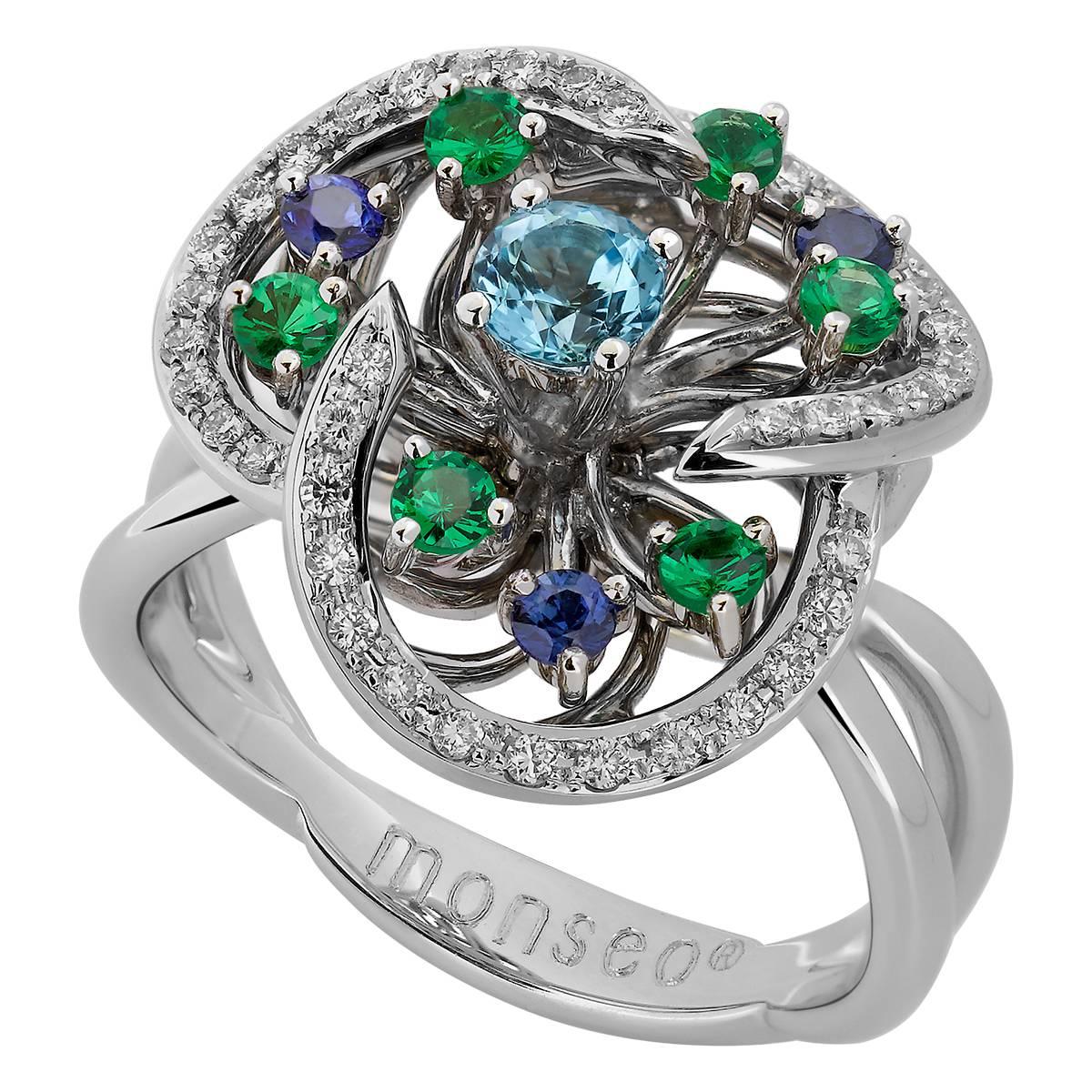 Monseo Blue Topaz, Tsavorites, Sapphires and Diamond Floral White Gold Ring For Sale