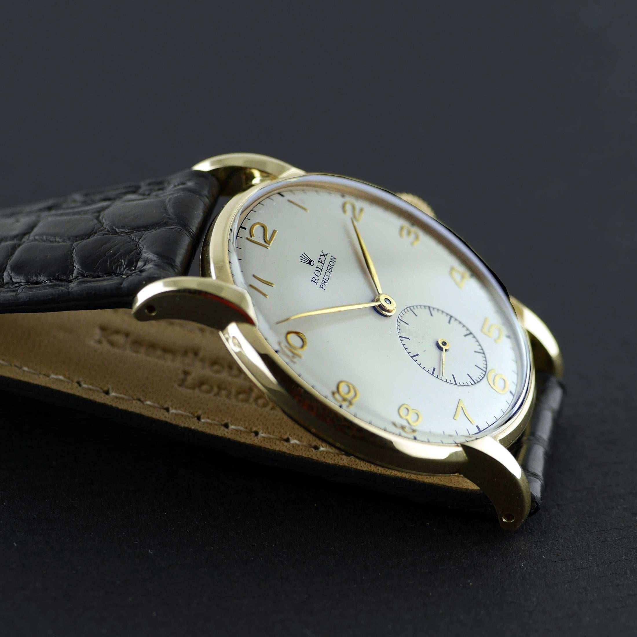 Rolex Precision:: 14 Karat Gold:: um 1945. 2