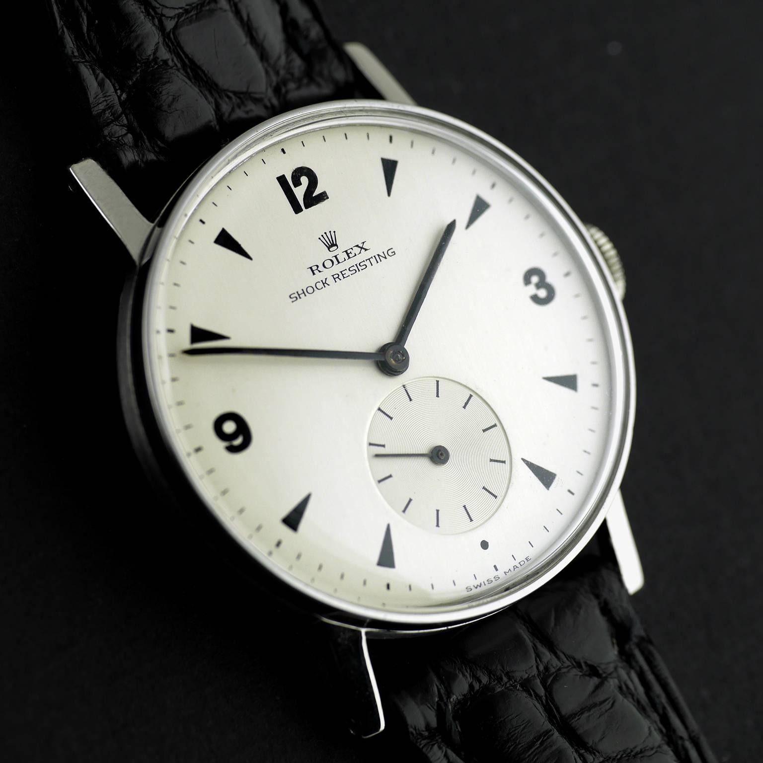 Model 4517.

A Precision wristwatch by Rolex made circa 1945.

Snap back Stainless Steel shock resisting case. 

17-Rubies precision lever escapement movement with Superbalance.

Silvered dial with black Arabic Numerals for 12, 6 and 3 and