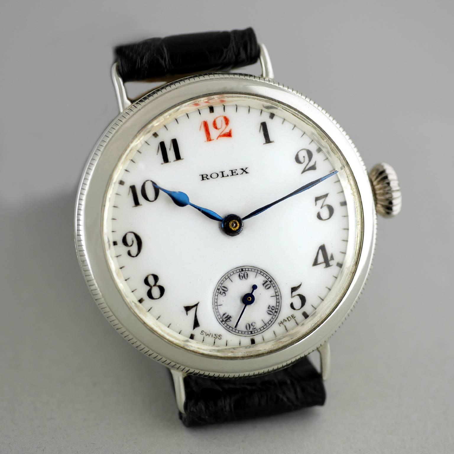 A rare vintage Officers wristwatch by Rolex made in 1917.

Sterling Silver round case with screw down bezel and back, hallmarked for London Import into the United Kingdom in 1917.

15-Jewel Rolex movement .

White enamel dial with black period