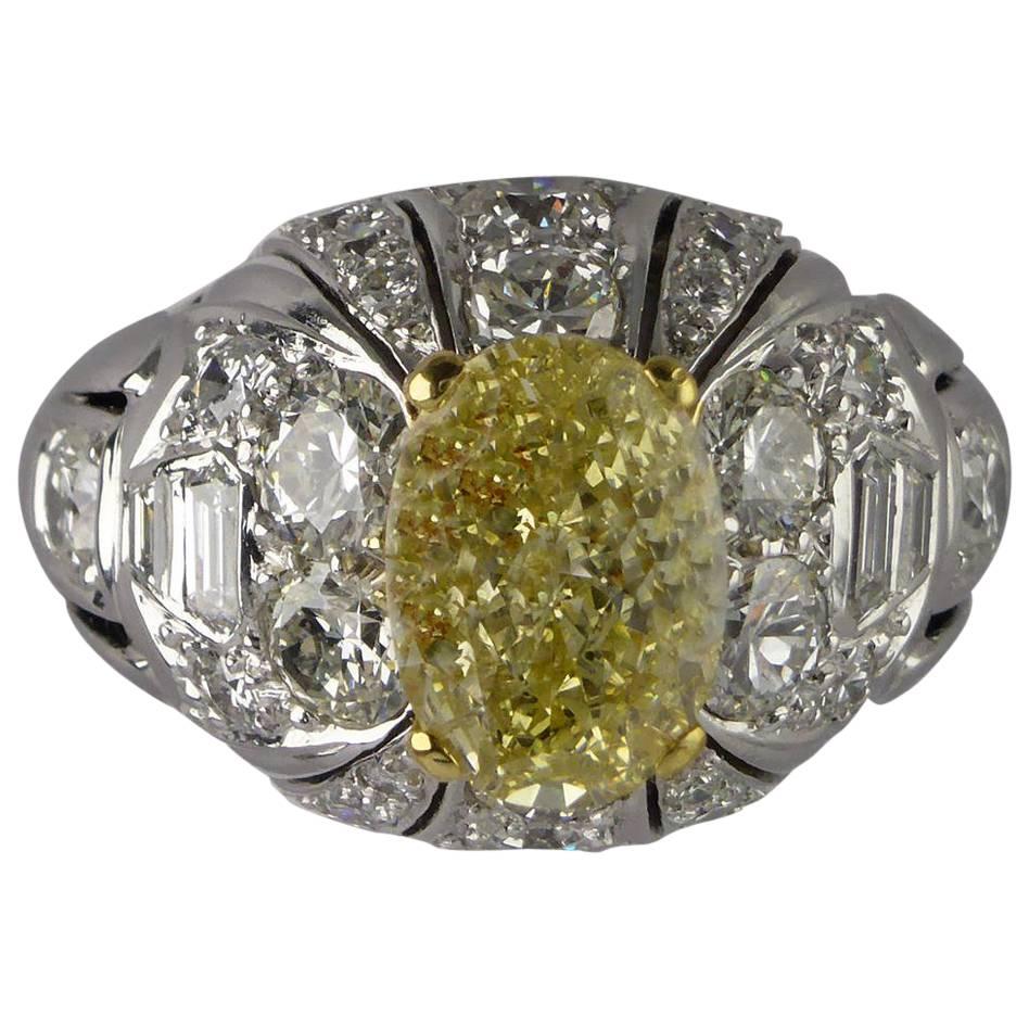 Certified Fancy Yellow Untreated Diamond 2.11 Carat Gold Bombe Ring, circa 1960