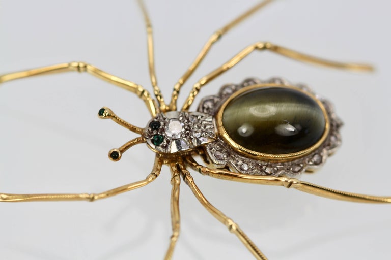As many of you know I just love vintage or antique insect jewelry and this spider is no exception.  This piece comes out of Germany and is circa 1930's. It is a beautiful Cat's Eye woth a perfect center slit and this is surrounded by a finely