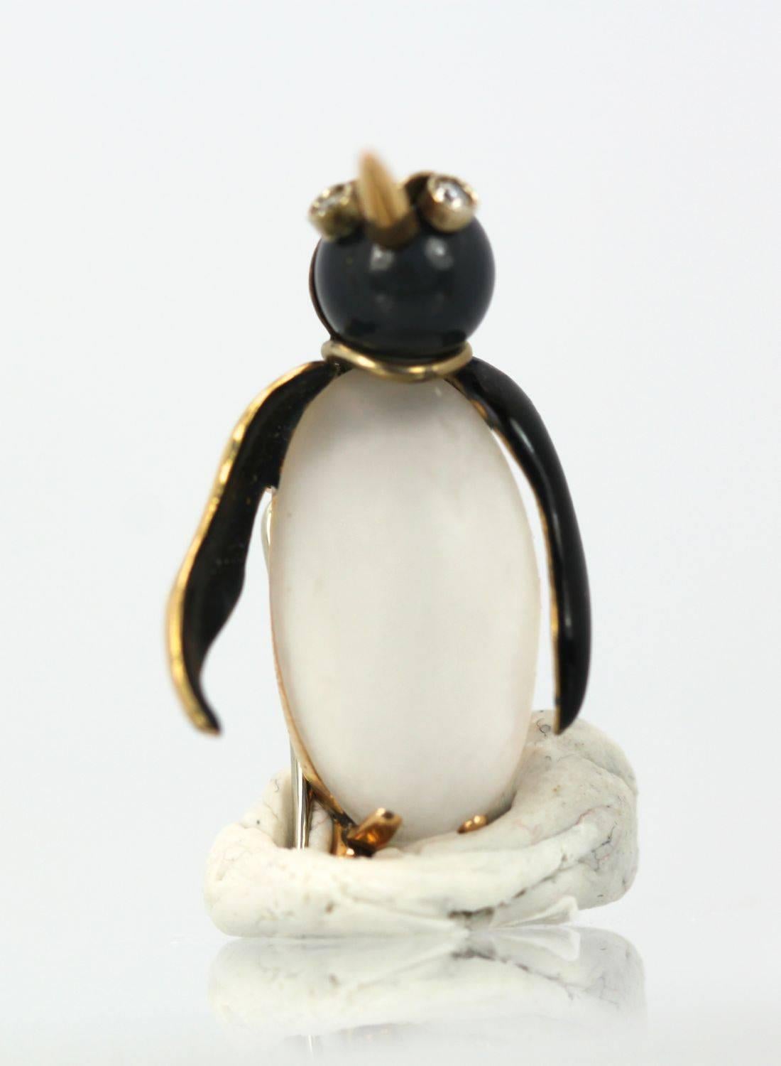 These delightful 18K Gold Moonstone penguins are attributed to Fasano, a fine jeweler in Italy and they are so cute.  Each penguin has a main body of Moonstone one at 5.00 carats and the other at 6.00 carats, with Black enamel bodies set in Yellow