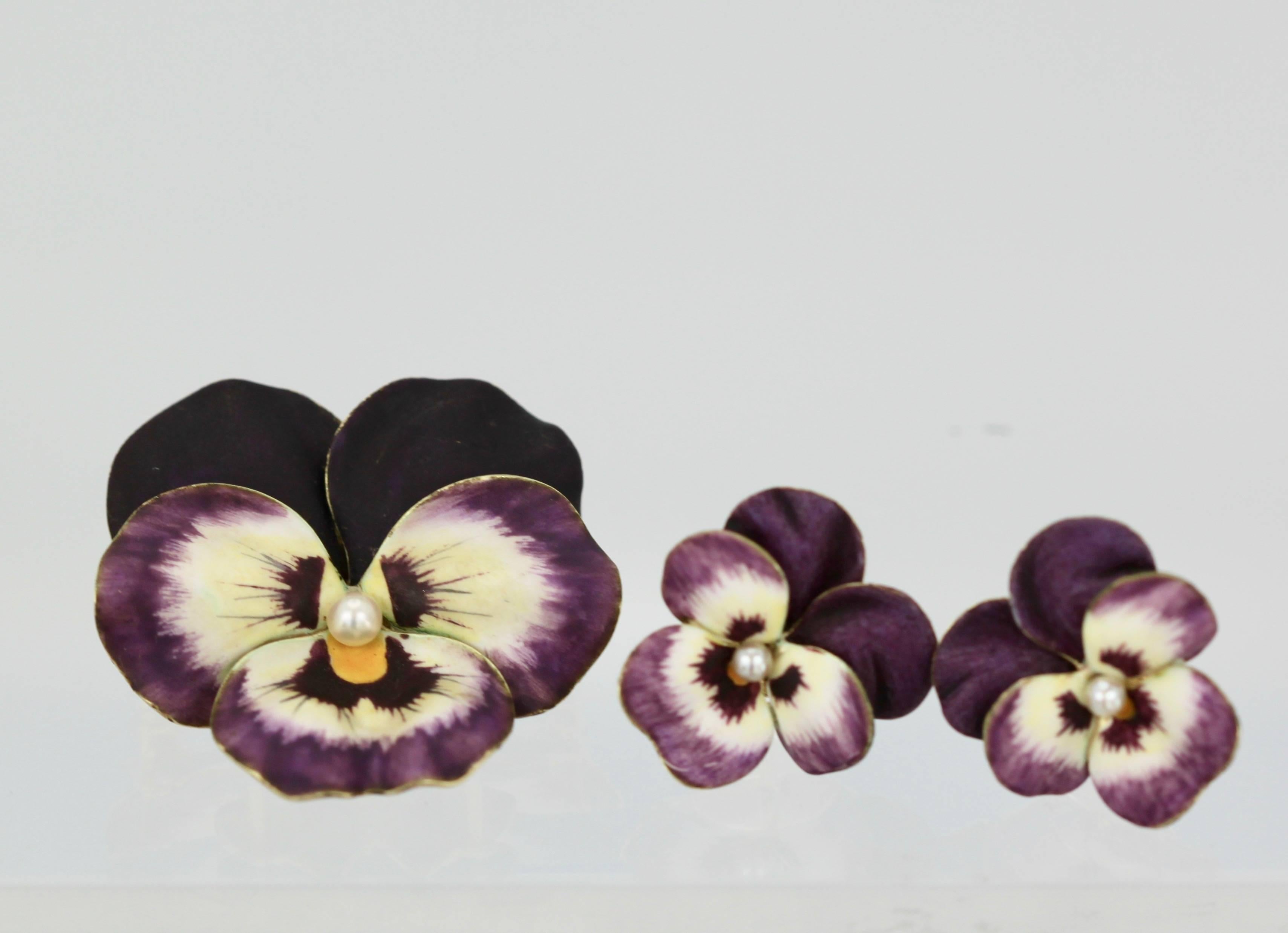 This vintage pansy set is in fantastic condition.  The earrings were a non pierced screw back style which was common in the day.  I had these changed to posts for pierced ears.  The Brooch has a place clip for hanging on a chain if you wish. The