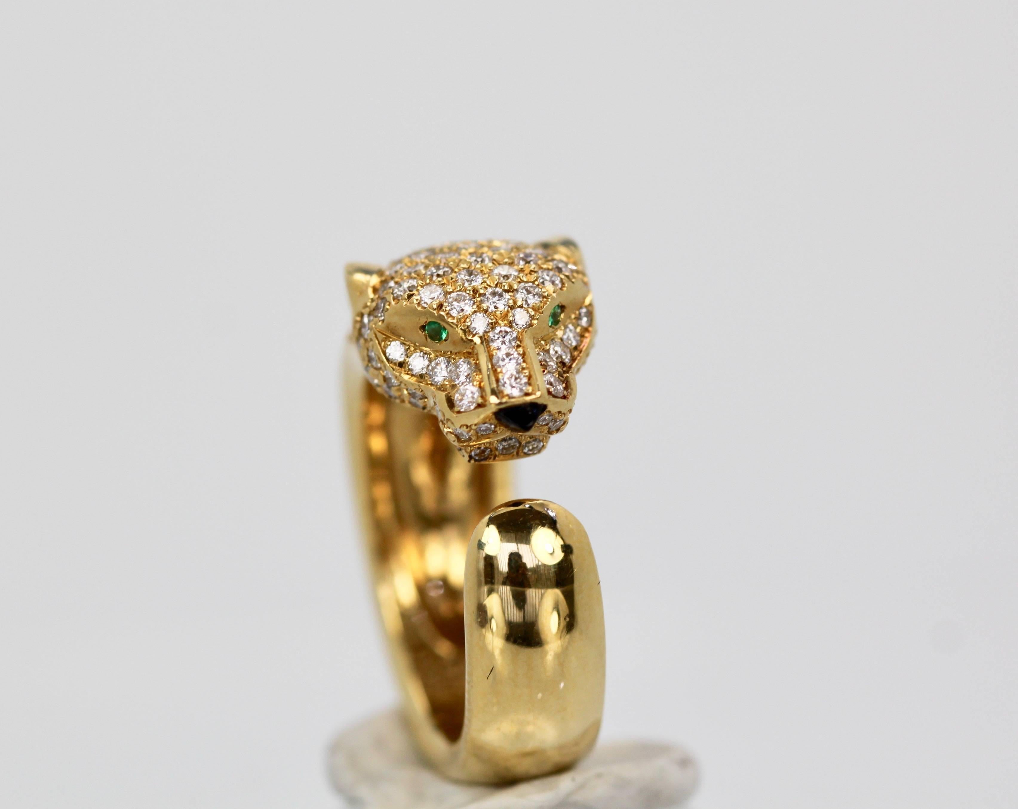 This gorgeous Cartier Panthere Ring is done in 18K Yellow Gold with a full Diamond Head. Emerald Eyes, Onyx Nose and 137 full cut Diamonds to total 1.15 Carats. Barely used and in excellent condition, this is a steal. 

Metal: 18K Yellow Gold