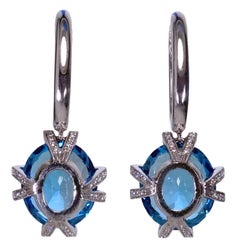 Highly Crafted 18K Gold Diamond Earrings with Electric Blue Zircon Color Stones