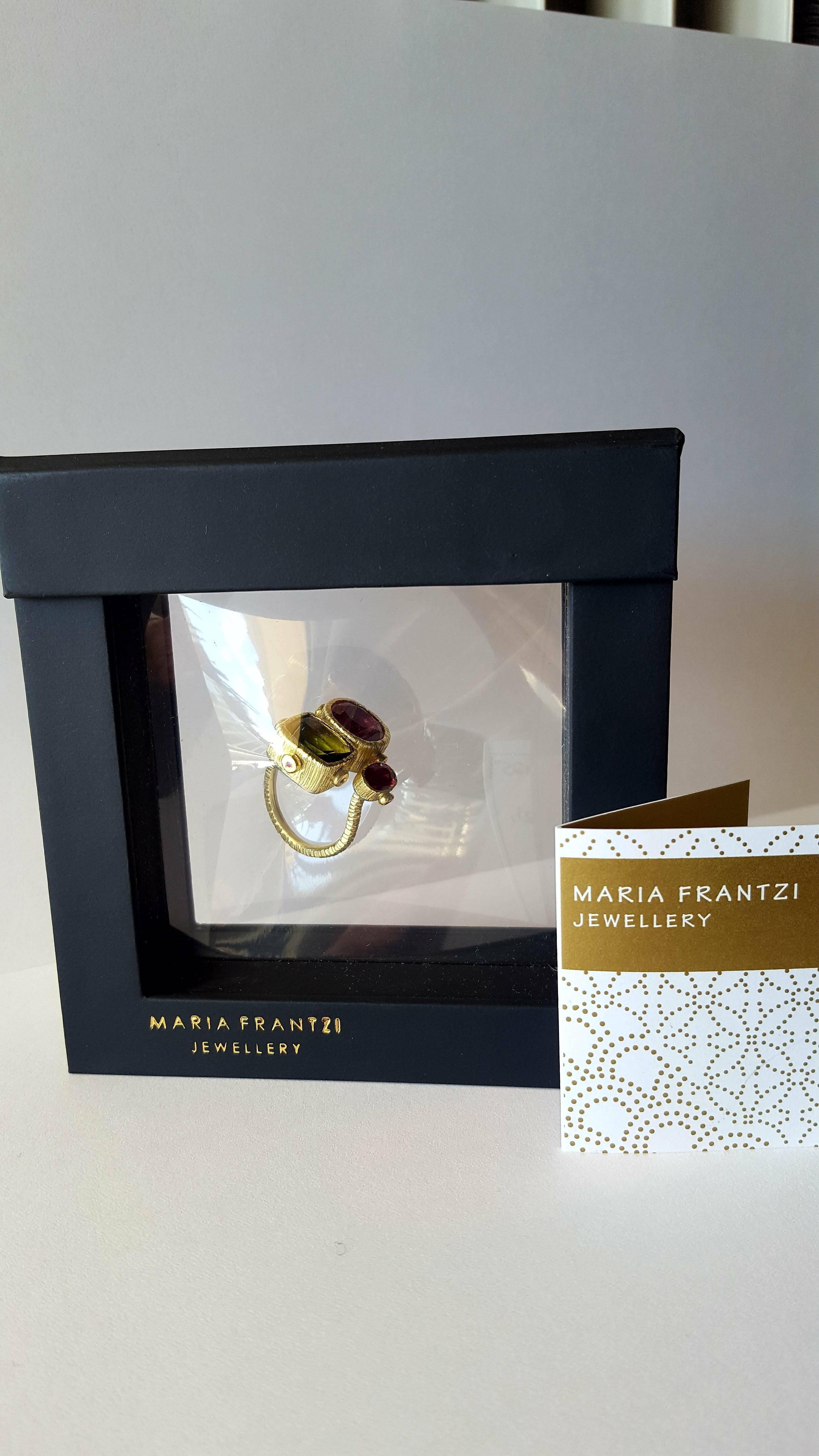 Women's One of a Kind Rubelite Peridot and Sapphires Cocktail Ring in Gold and Silver For Sale