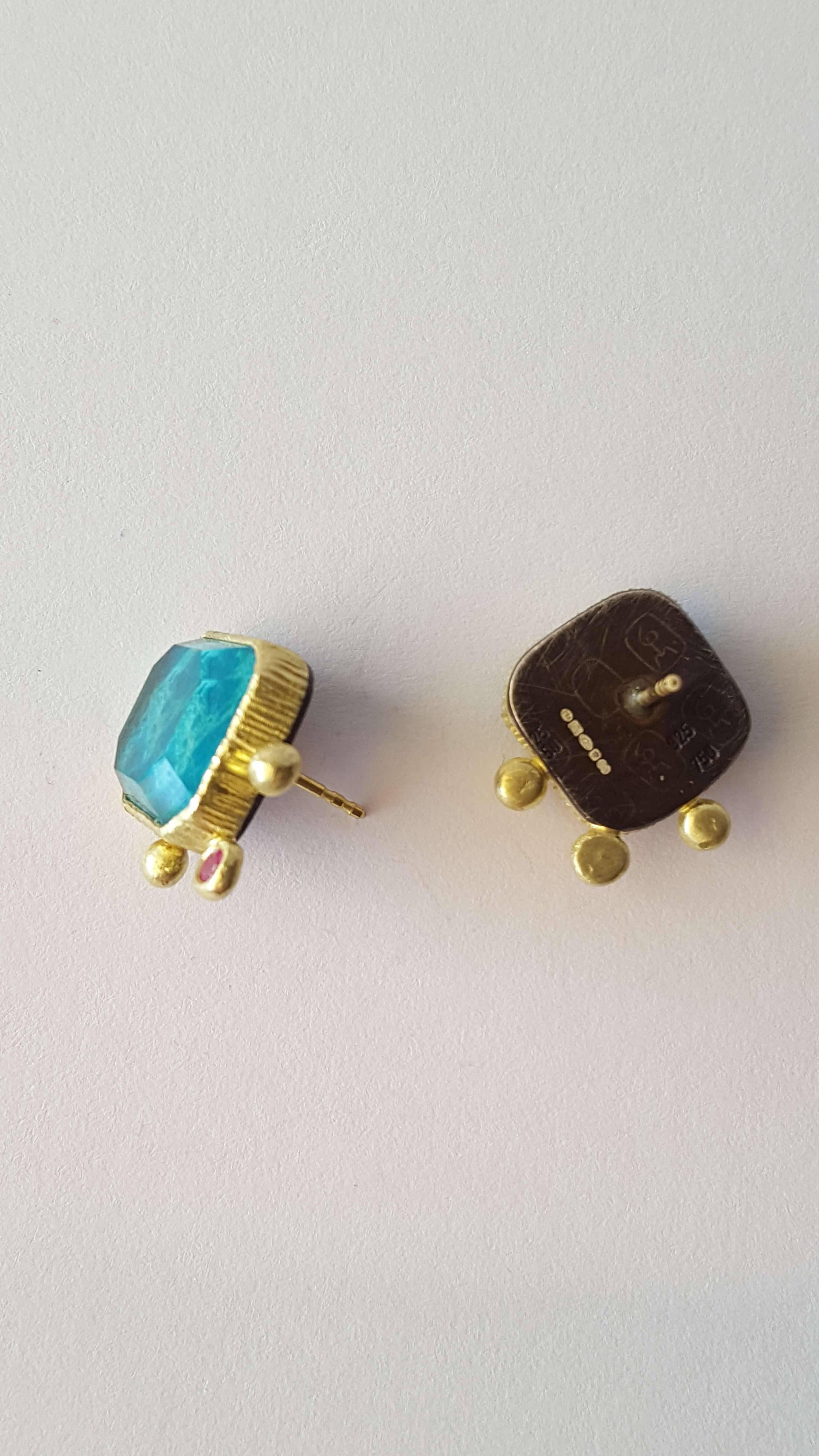 Lovely pair of stud earrings made with 18 karat green gold and black, oxidised sterling silver at the back with chrysocolla/rock crystal doublets and sapphires. Hand made and colourful earrings with amazing stones. Posts are 18 karat gold and