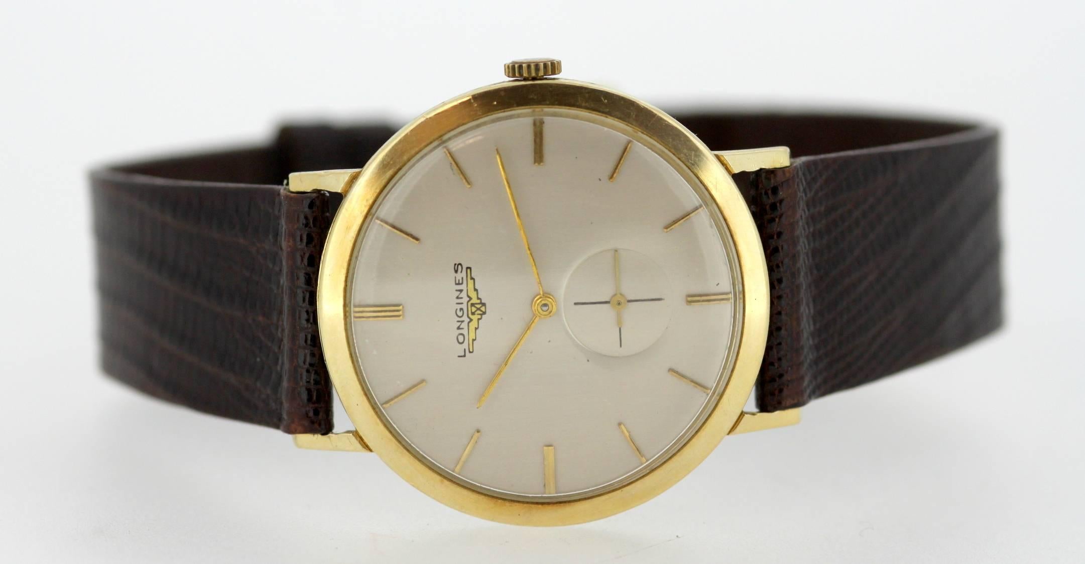 longines gold watch 1960 price