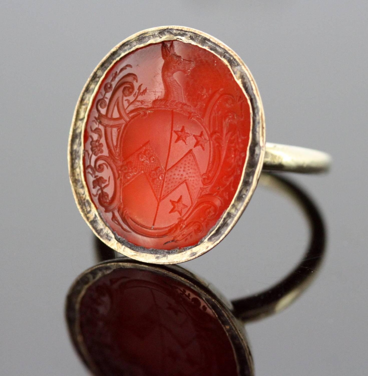 Antique Victorian 15K Yellow Gold Seal Ring With Carnelian (possibly Australian Coat of Arms)
Circa.1860's

Dimensions -
Finger Size: (UK) = S (US) = 9 1/2 (EU) = 60 1/4
Ring Size : 3.2 x 2.7 x 2.45 cm
Weight: 9 g 

Condition: Ring is in antique