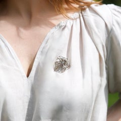 Boucheron vintage 18kt white gold diamond floral brooch, Circa 1950s