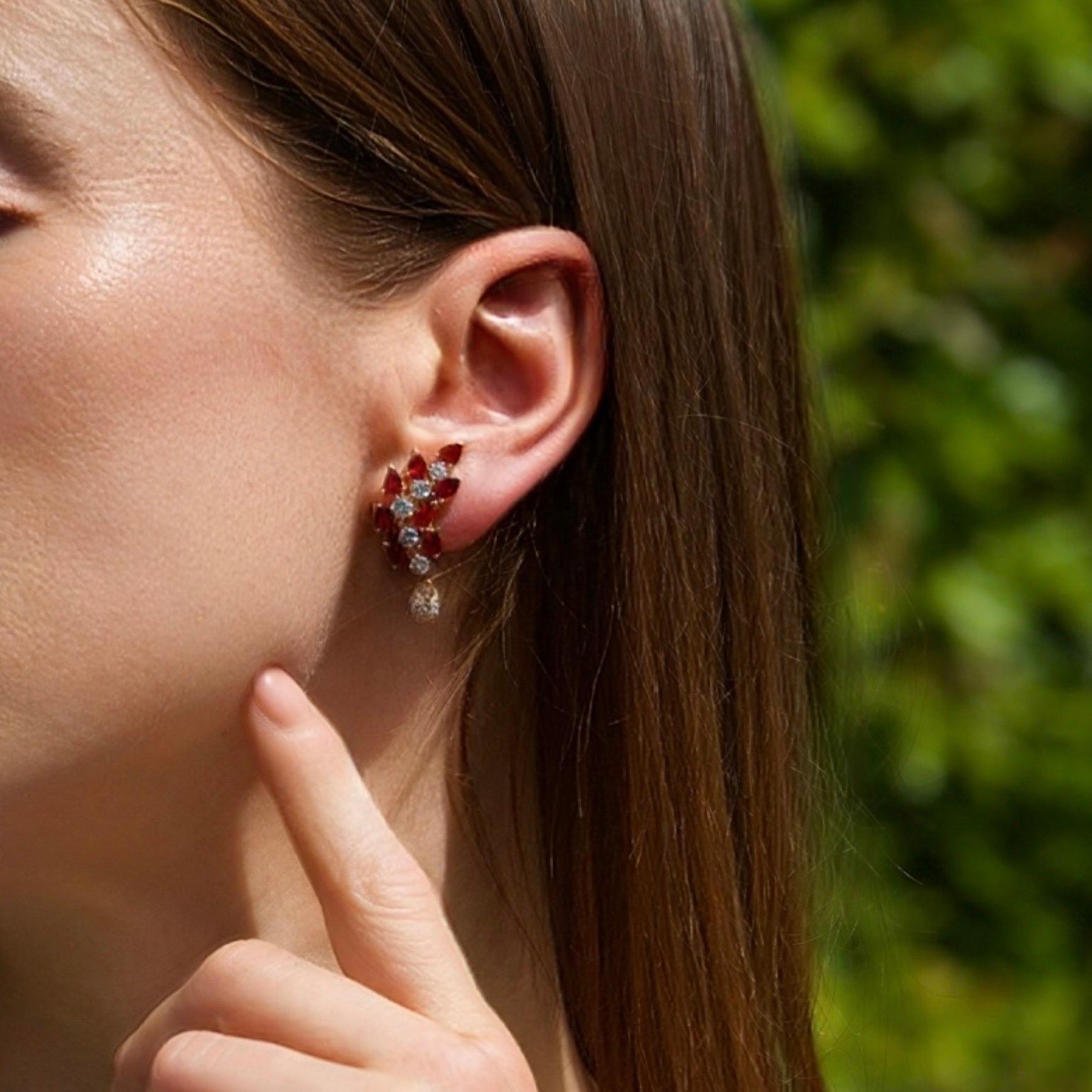 Vintage 18kt Gold Earrings with Natural Unheated Burma Rubies and Diamonds

Each earring features 8 pear-cut Burmese rubies, totalling approximately 4.00 carats across the pair. These rubies are certified no heat, retaining their exceptional natural