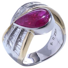 Anillo de rubíes y diamantes en platino y oro de 18 quilates