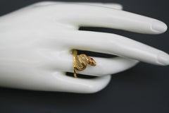 Antique 19th Century 18 Karat Yellow Gold Egyptian Snake Ring with 2 Ruby Eyes