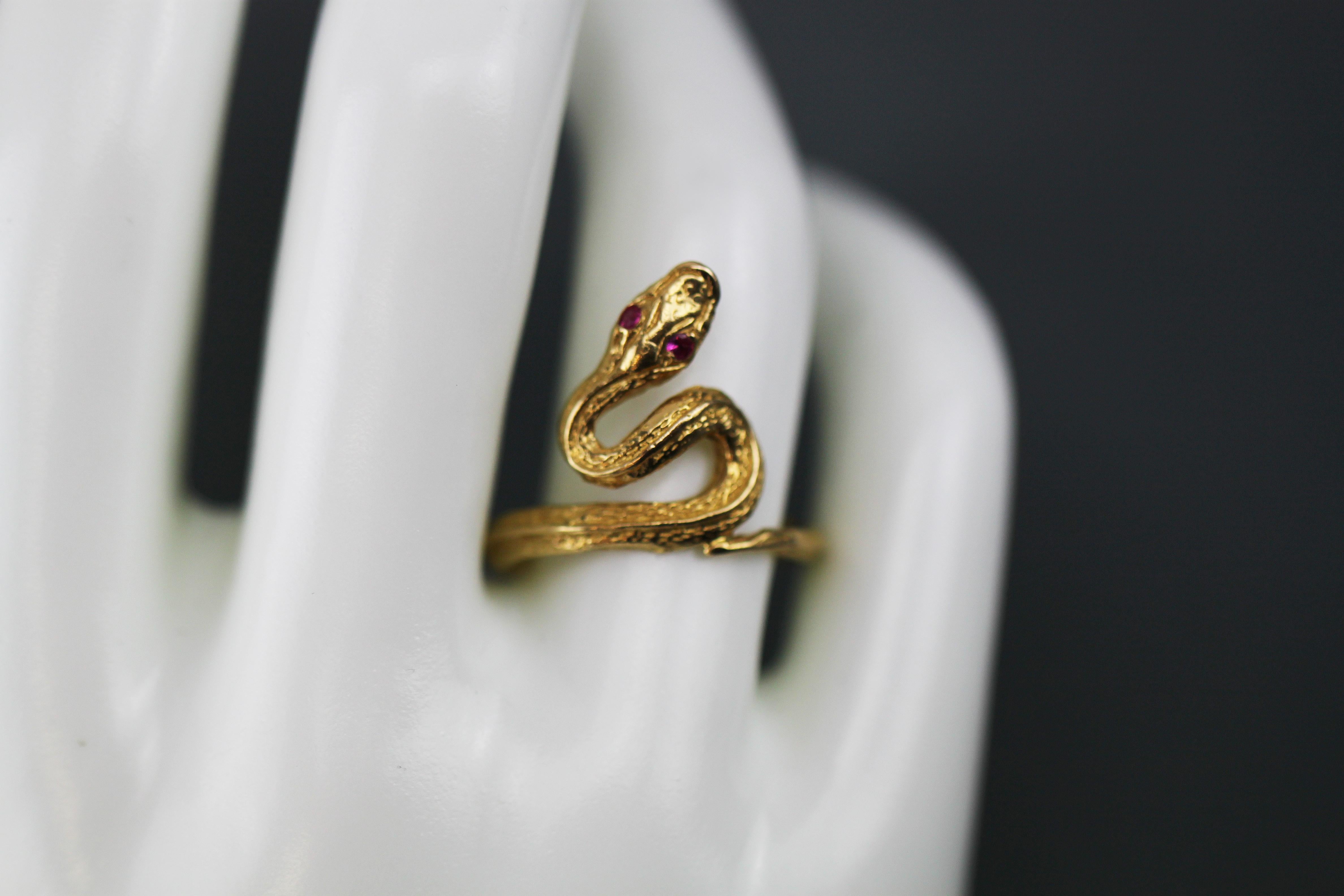 gold snake ring with ruby eyes