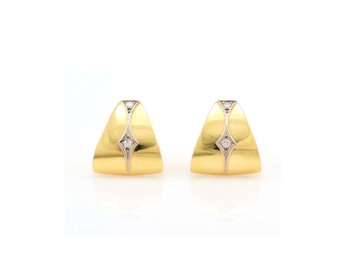 Beautifully tailored 18k yellow earring clips with diamond accents.