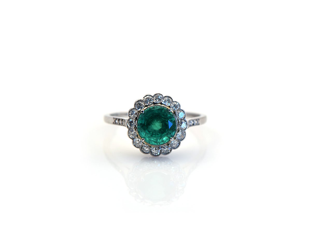 An enchanting emerald beauty.

*The emerald is 1.5ct
*Total diamond weight is .50ct
*Platinum
*Ring size 7
