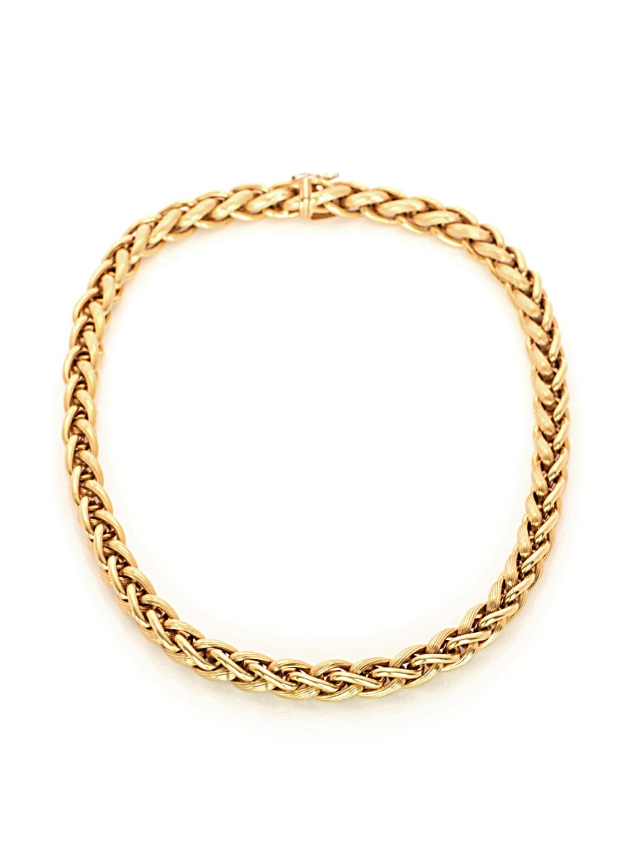 A beautifully textured, smooth, and golden Italian made chain. Created in 18kt gold.  The links are heavy walled and hollow. 

*width measures 3/8