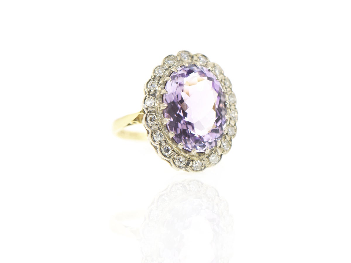 This little beauty will add just the right touch of pastel color. The amethyst is perfectly complimented with bright single cut diamonds in 14k white gold and a yellow gold shank.  Ring is a size 5.5