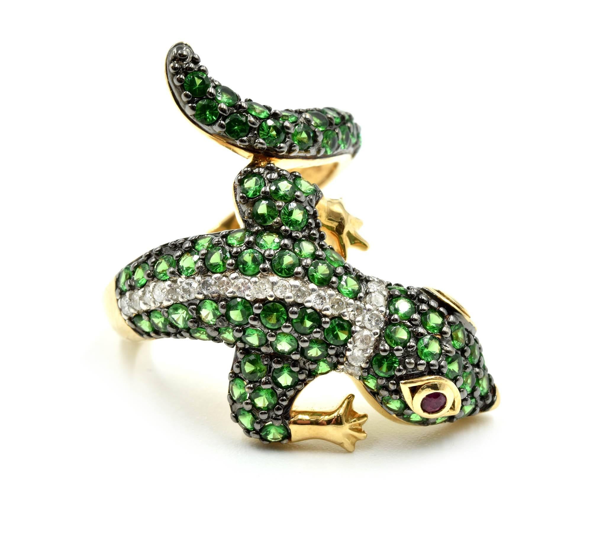 Designer: custom made
Material: 14k yellow gold 
Diamonds: 0.17 total carat weight
Tsavorites: 1.58 total carat weight
Rubies: 0.03 total carat weight
Dimensions: top of ring is 32mm long
Ring size: ring size is 8 currently, allow two extra shipping