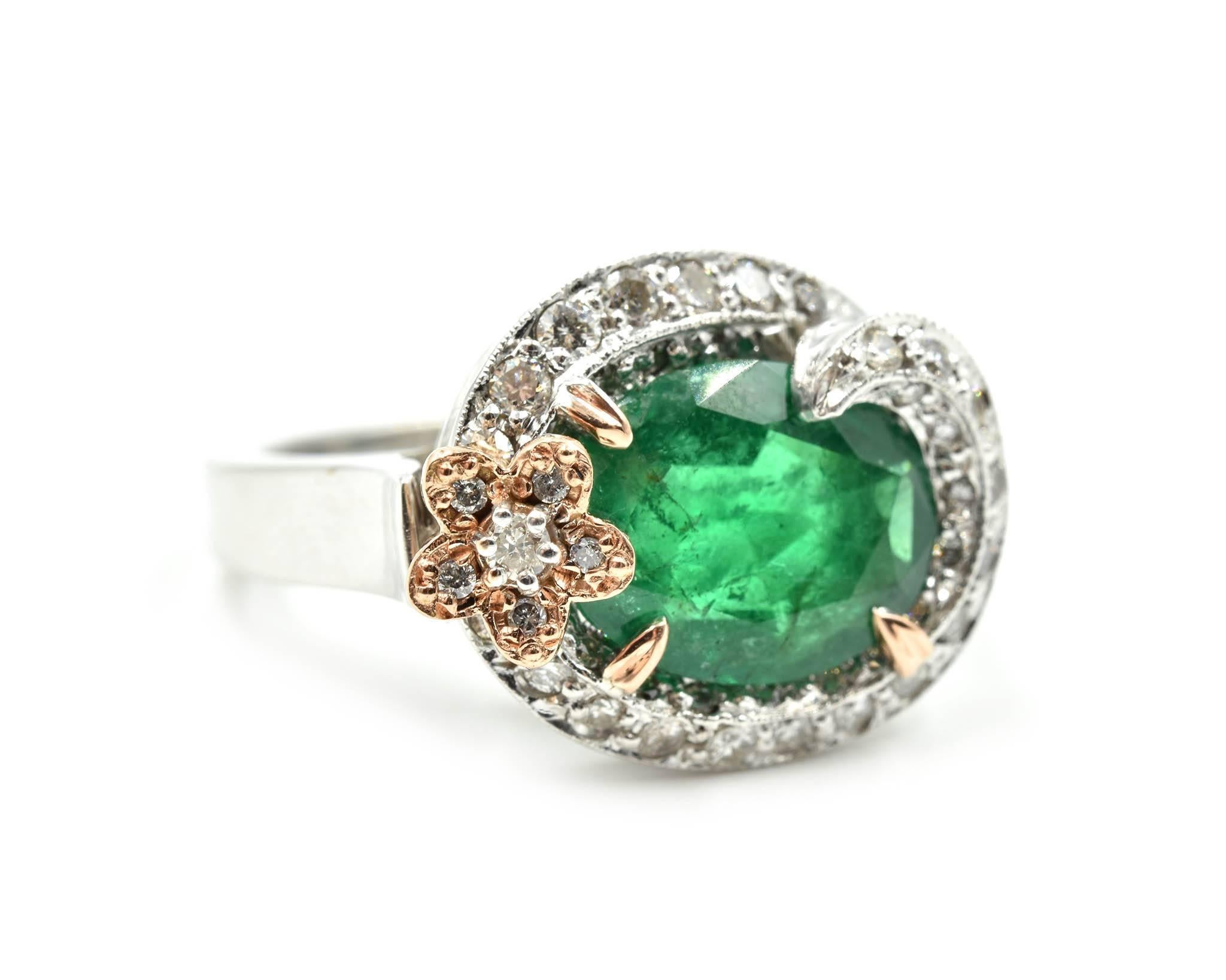 Designer: custom made
Gemstone: oval cut 3.11 carat emerald
Diamonds: 0.81 total carat weight
Clarity: SI
Color: H-I
Material: 14k white & rose gold
Ring size: ring size is currently a 6, please allow two extra shipping days for sizing