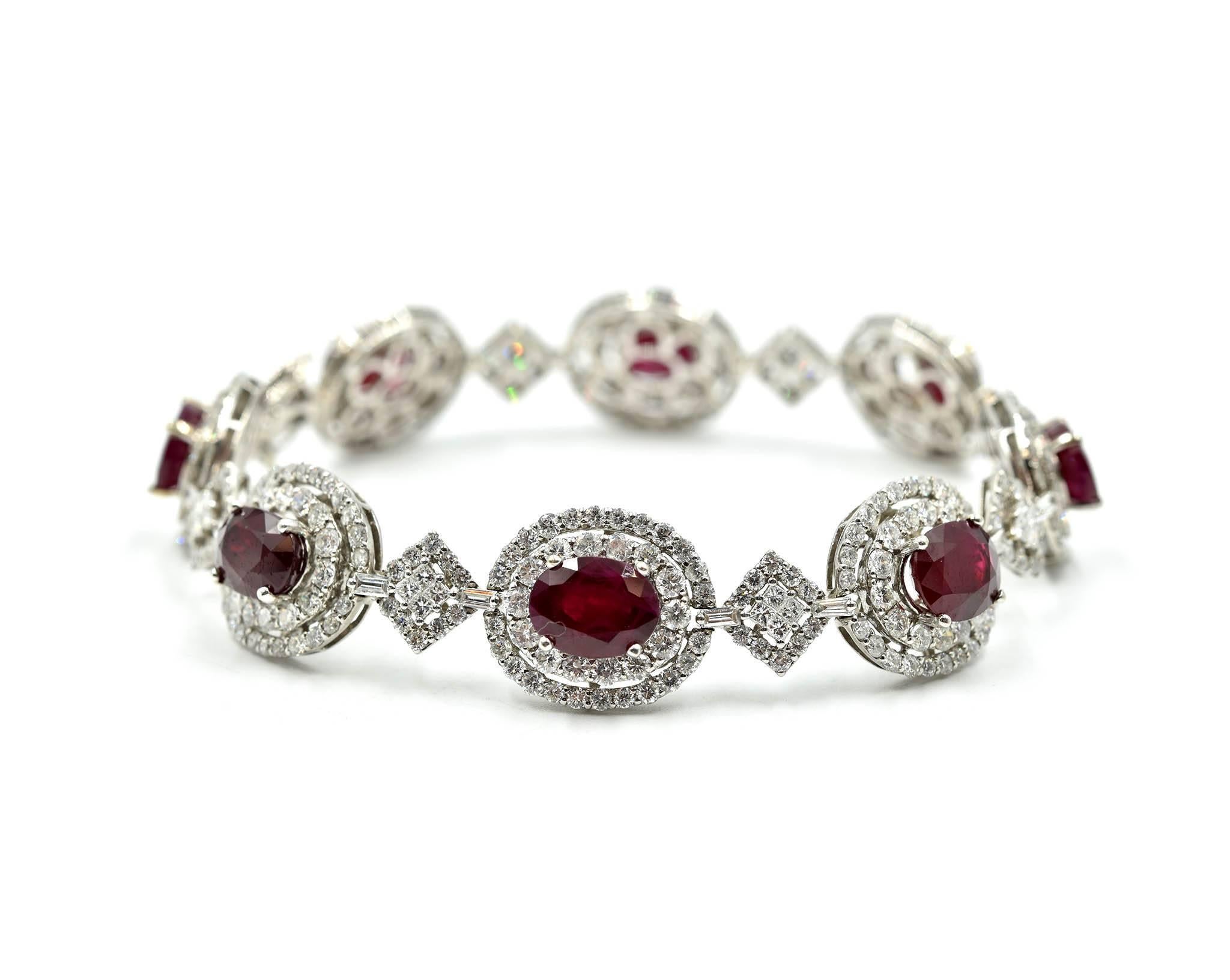 Designer: custom design
Material: 18k white gold
Rubies: oval cut, 8.00 total carat weight
Diamonds: round brilliant cut, 9.12 total carat weight
Color: G-H
Clarity: SI2
Dimensions: bracelet is 7 inches long and ½ inch in width
Weight: 21.74 grams
