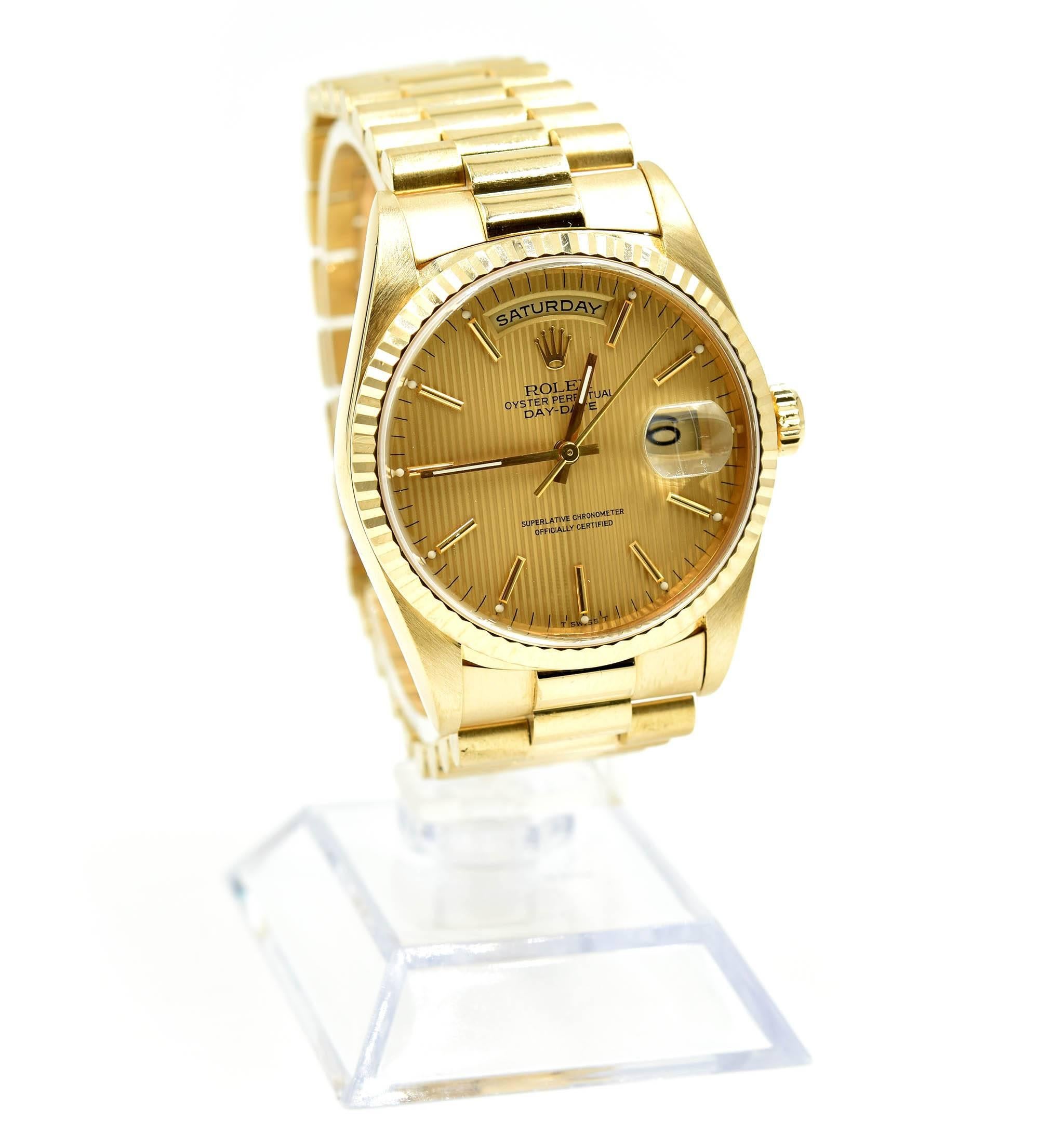 Movement: automatic 3155 movement w/ double Quickset feature
Function: hours, minutes, seconds, day, date
Case: 36mm round 18k yellow gold case with 18k yellow gold fluted bezel, sapphire protective crystal, screw-down crown
Band: 18k yellow gold