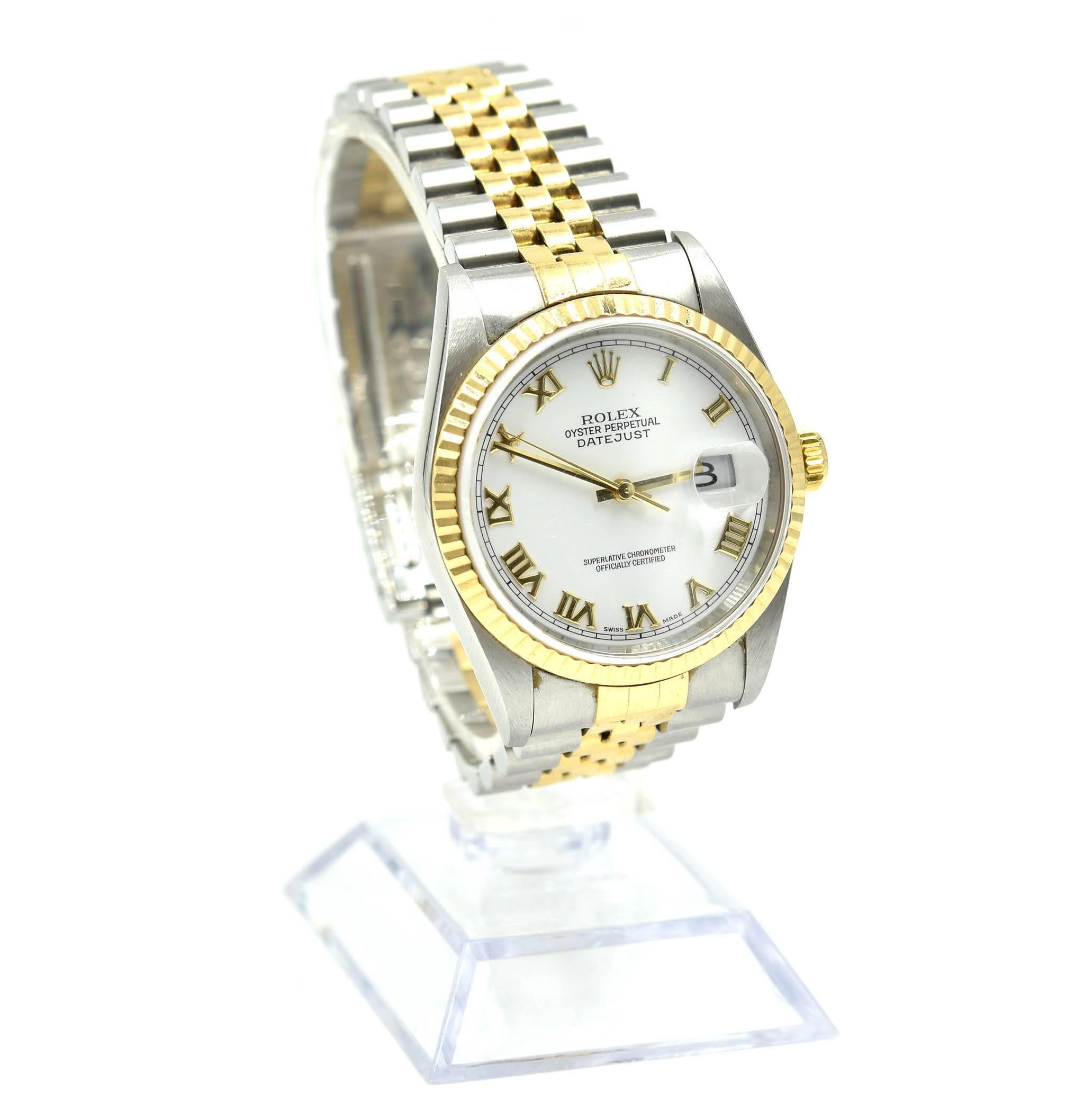 Movement: automatic
Function: hours, minutes, seconds, date 
Case: 36mm stainless steel round case with 18k yellow gold fluted bezel, sapphire protective crystal, screw-down crown, date bubble at 3 o’clock
Band: 18k yellow gold and stainless steel