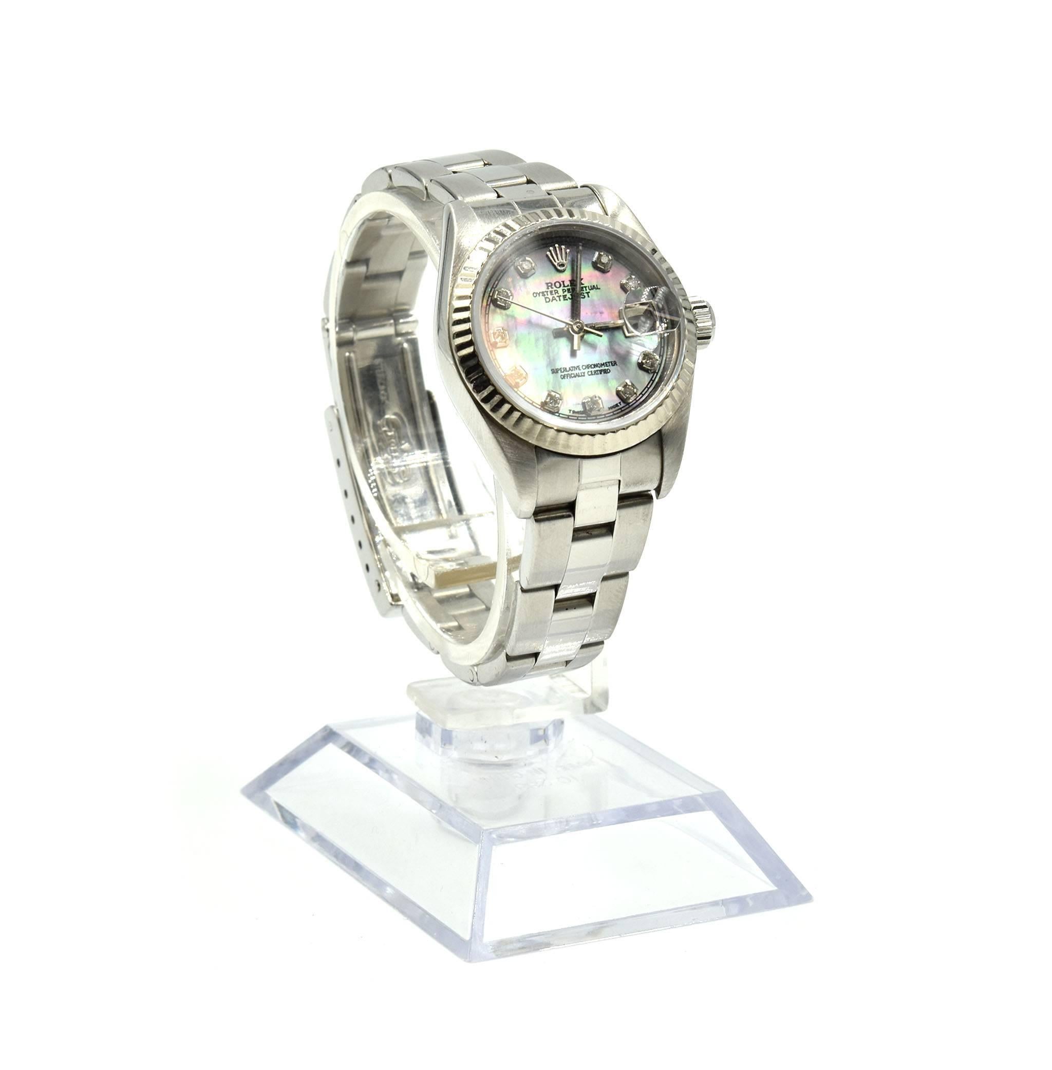 Movement: automatic
Function: hours, minutes, sweep seconds, date
Case: 26mm stainless steel case, sapphire crystal, fluted bezel, screwdown crown, water resistant to 100 meters
Band: stainless steel Oyster bracelet, fits up to a 6.5-inch