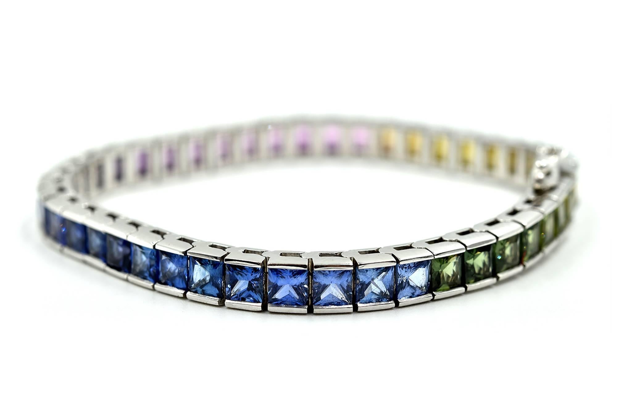 Princess Cut 14 Karat White Gold and 10.1 Carat Blue Sapphire In-Line Tennis Bracelet
