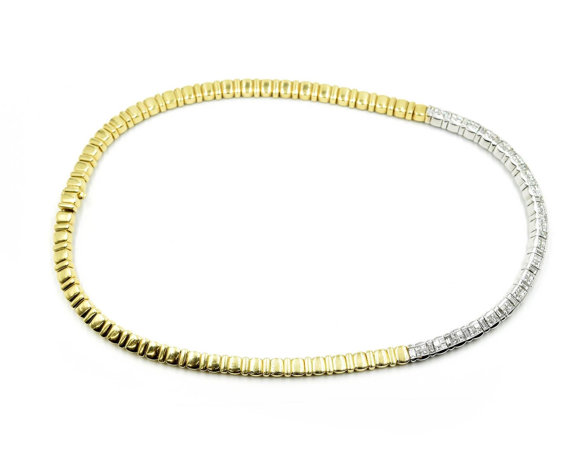 This necklace makes a statement! This necklace consists of 18k white and yellow gold links with diamonds. The necklace has 101 diamonds channel set in the white gold links. The diamonds are cut in princess and baguette shapes. The necklace measures