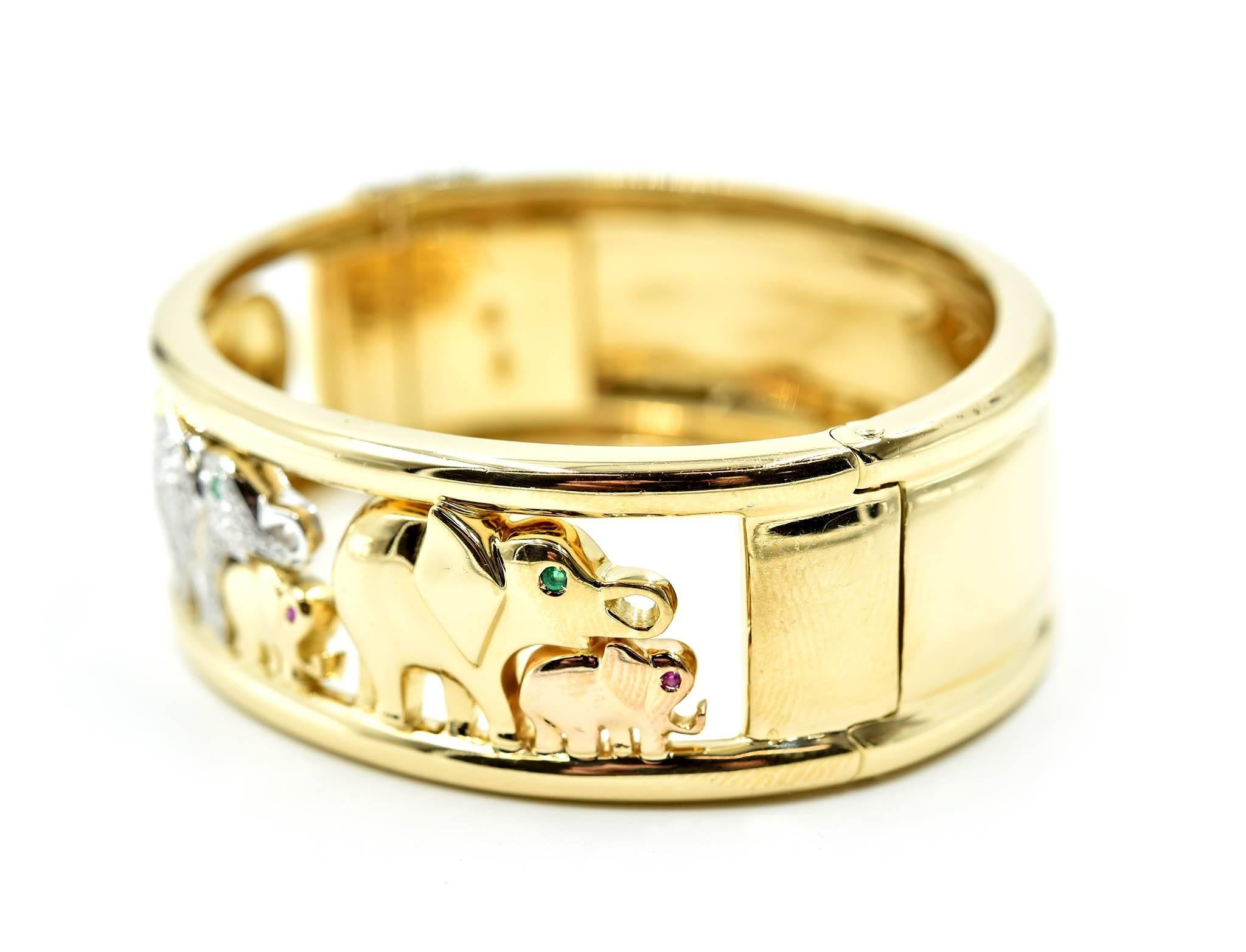 Ladies 0.71cttw Diamond, Emerald, Ruby Elephant 18k Yellow Gold Bangle Bracelet In Excellent Condition In Scottsdale, AZ