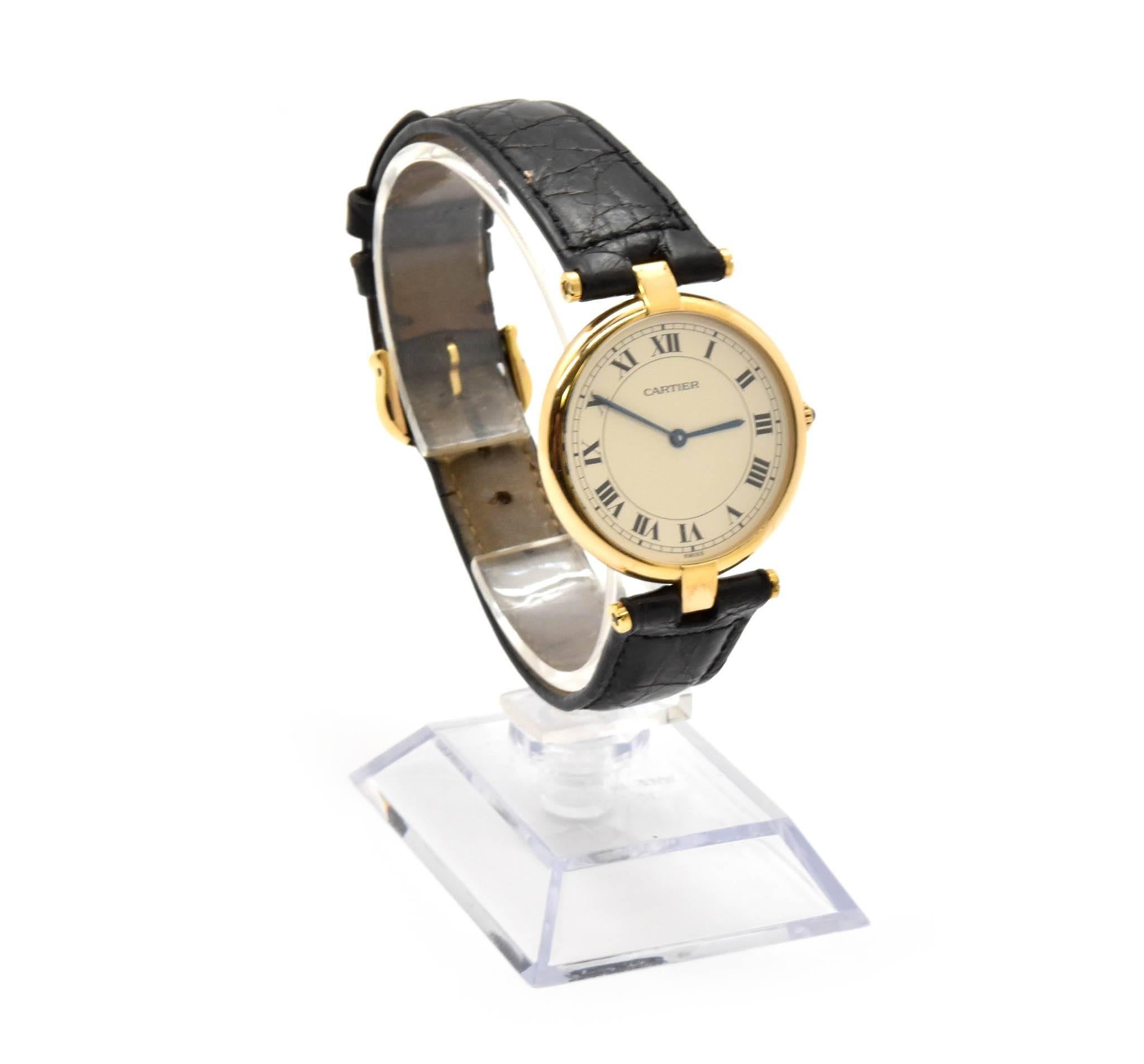 Movement: quartz
Function: hours, minutes
Case: 30mm yellow 18k yellow gold case, pull/push spinel crown, 18k yellow gold t-bar lugs, protective crystal
Band: black croc strap with gold buckle
Dial: original Cartier white matte roman numerals dial,