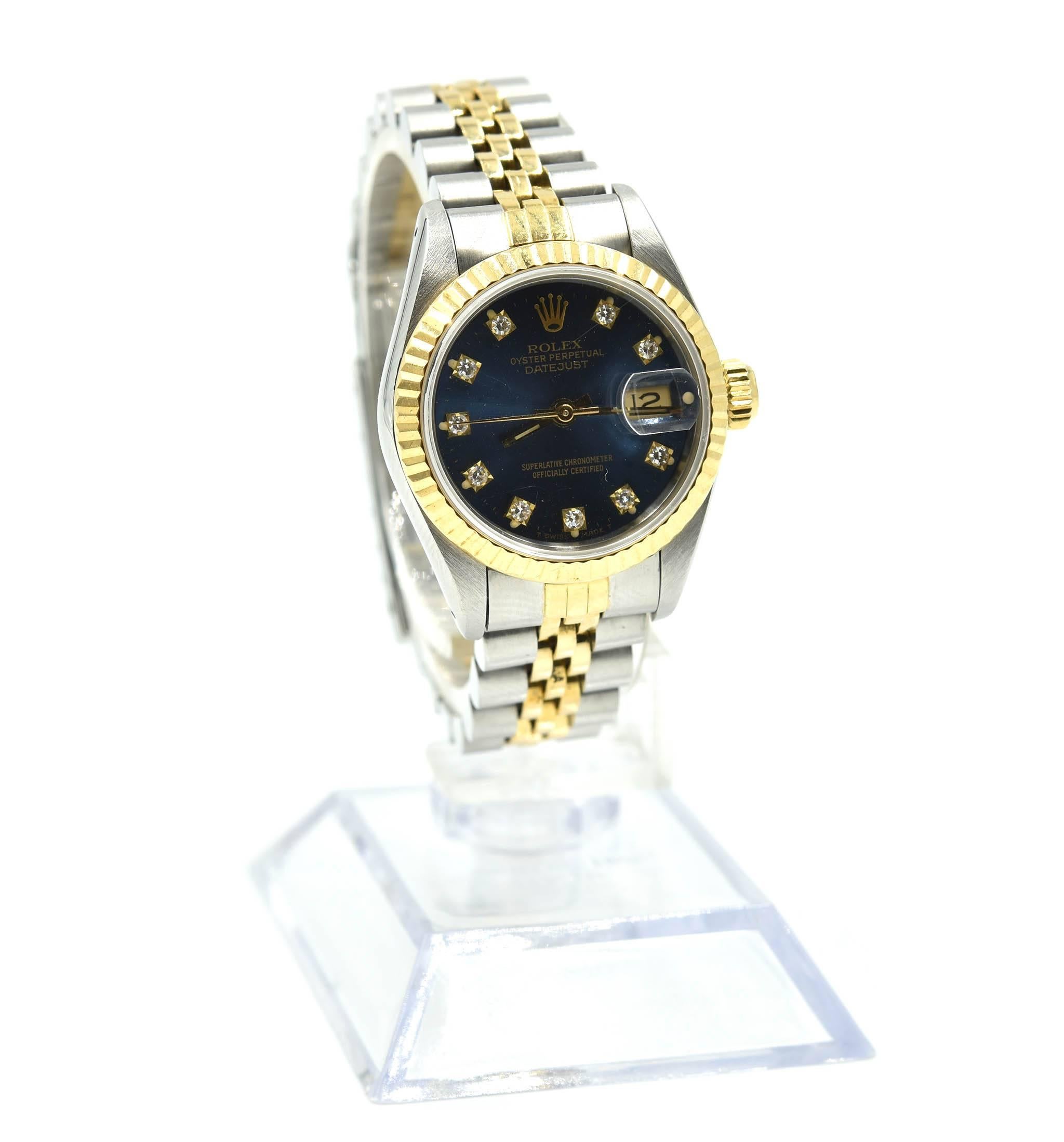 Movement: automatic
Function: hours, minutes, sweep seconds, date
Case: round 26mm stainless steel and 18k yellow gold case, 18k yellow gold fluted bezel, sapphire protective crystal, screw-down crown, water resistant to 100 meters 
Band: 18k yellow