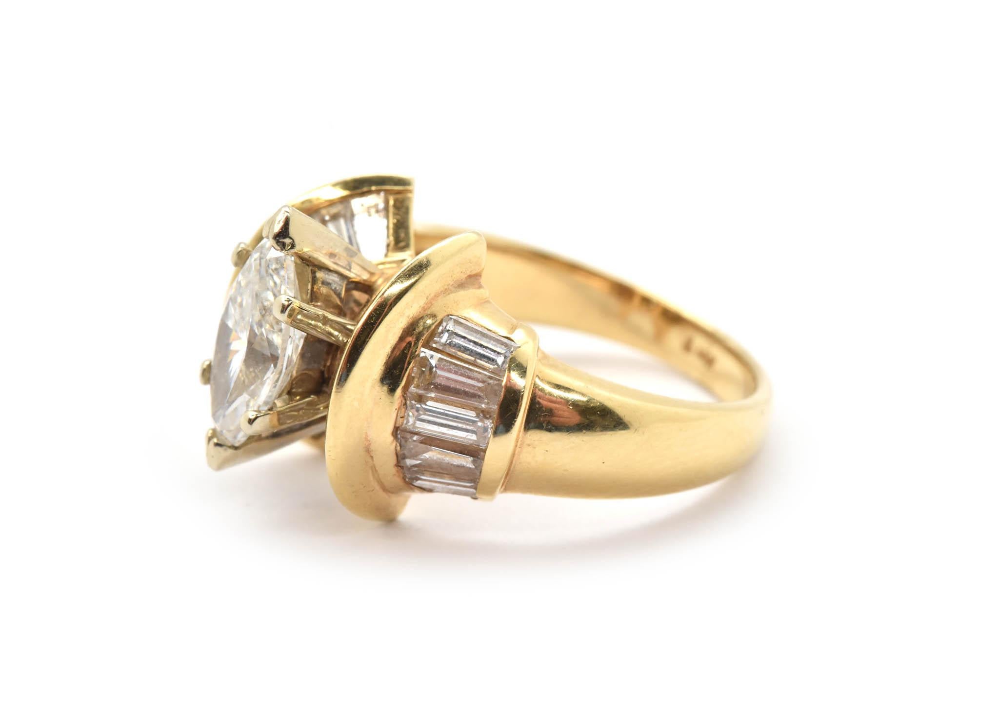 yellow gold marquise diamond with baguettes