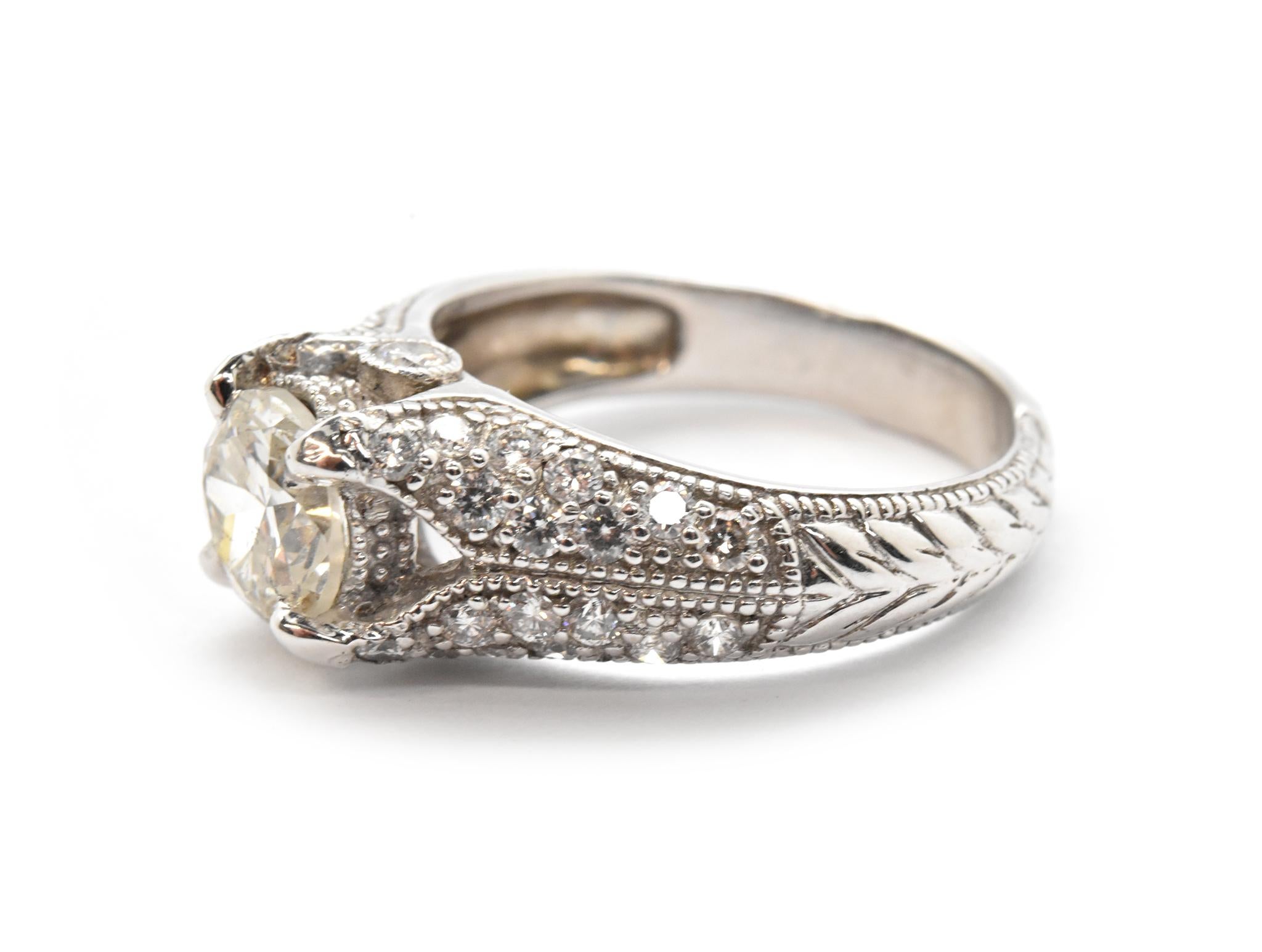 Round Cut 14 Karat White Gold and 1.38 Carat Round Diamond Ring with 0.75 Carat Accents For Sale